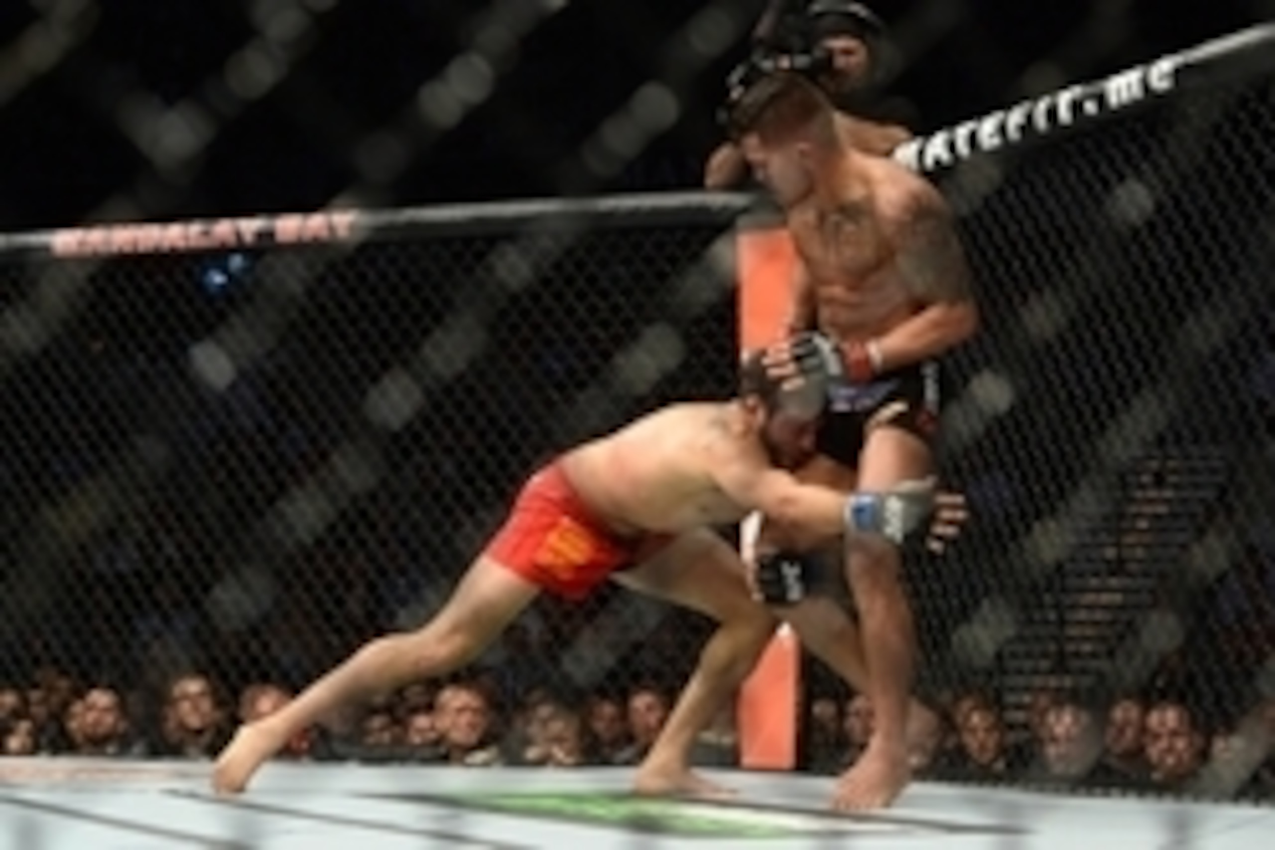 Dec 6, 2014; Las Vegas, NV, USA; Anthony Pettis (red) and Gilbert Melendez (blue) during UFC 181 at Madalay Bay Events Center. Pettis won via second round submission. Mandatory Credit: Joe Camporeale-USA TODAY Sports
