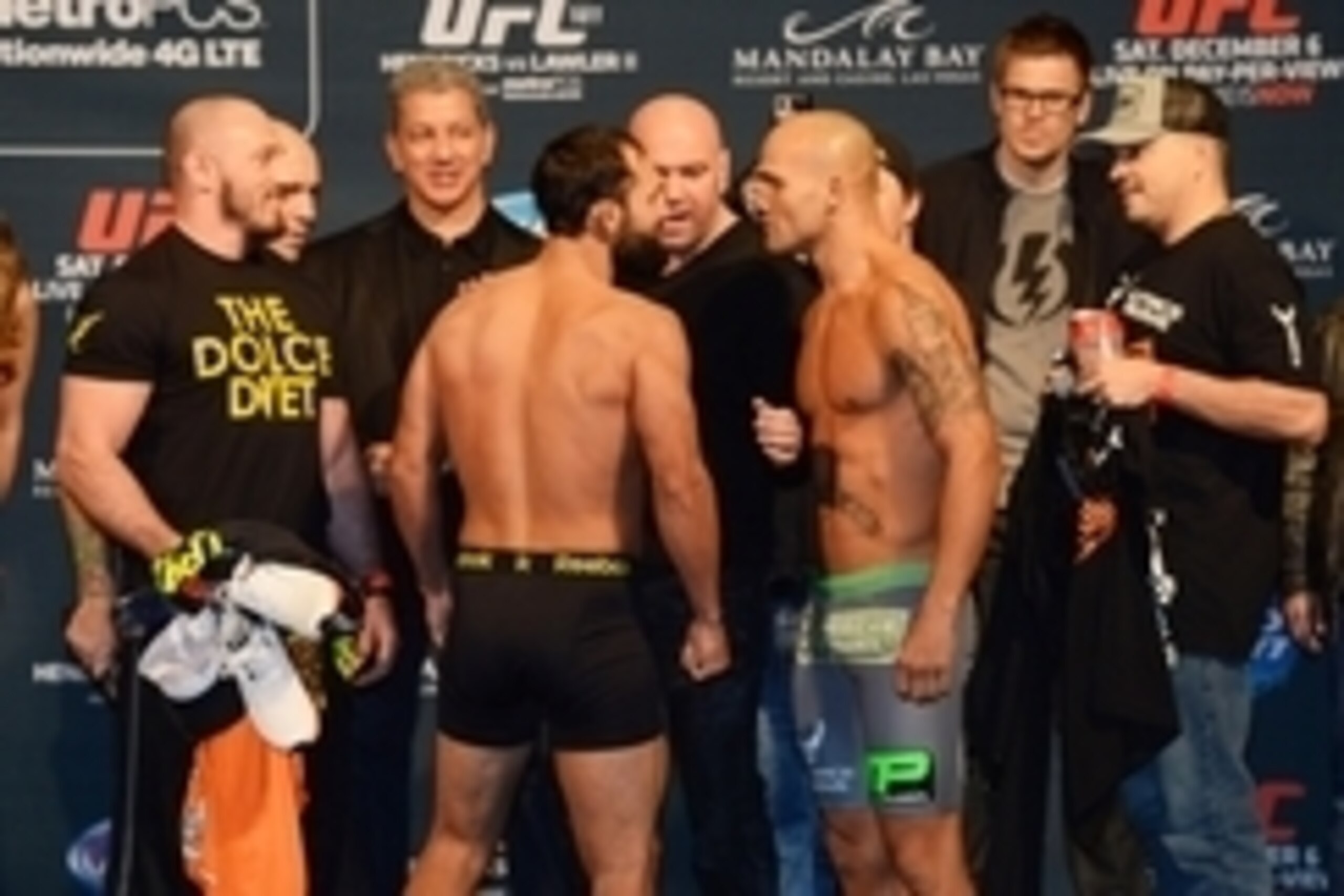 Dec 5, 2014; Las Vegas, Nevada, USA; Welterweight champion Johnny Hendricks (left) faces off in for his bout against Robbie Lawler (right) during the UFC 181 weigh-ins at Mandalay Bay Events Center. Mandatory Credit: Joe Camporeale-USA TODAY Sports
