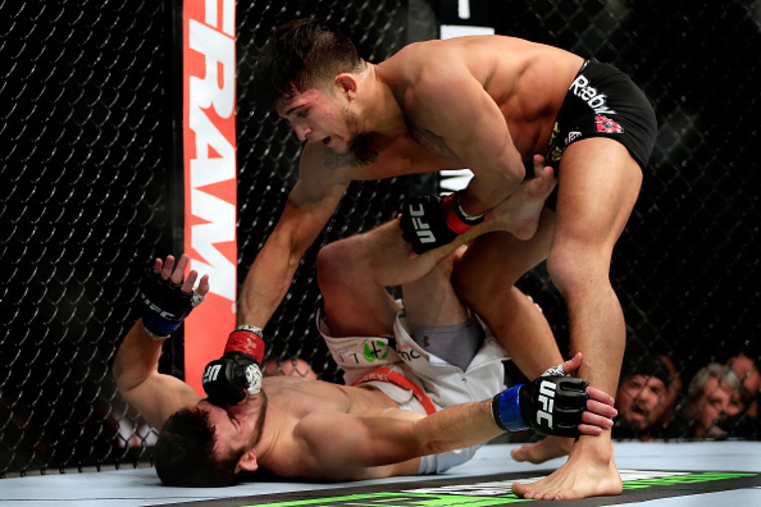 LAS VEGAS, NV - DECEMBER 06: Sergio Pettis lands a punch against Matt Hobar in their fight during the UFC 181 event at the Mandalay Bay Events Center on December 6, 2014 in Las Vegas, Nevada.  (Photo by Alex Trautwig/Getty Images)