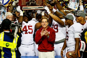 ATLANTA, GA - DECEMBER 06:  Head coach Nick Saban, Blake Sims #6 and the Alabama Crimson Tide celebrate their 42 to 13 win over the Missouri Tigers in the SEC Championship game at the Georgia Dome on December 6, 2014 in Atlanta, Georgia.  (Photo by Kevin 