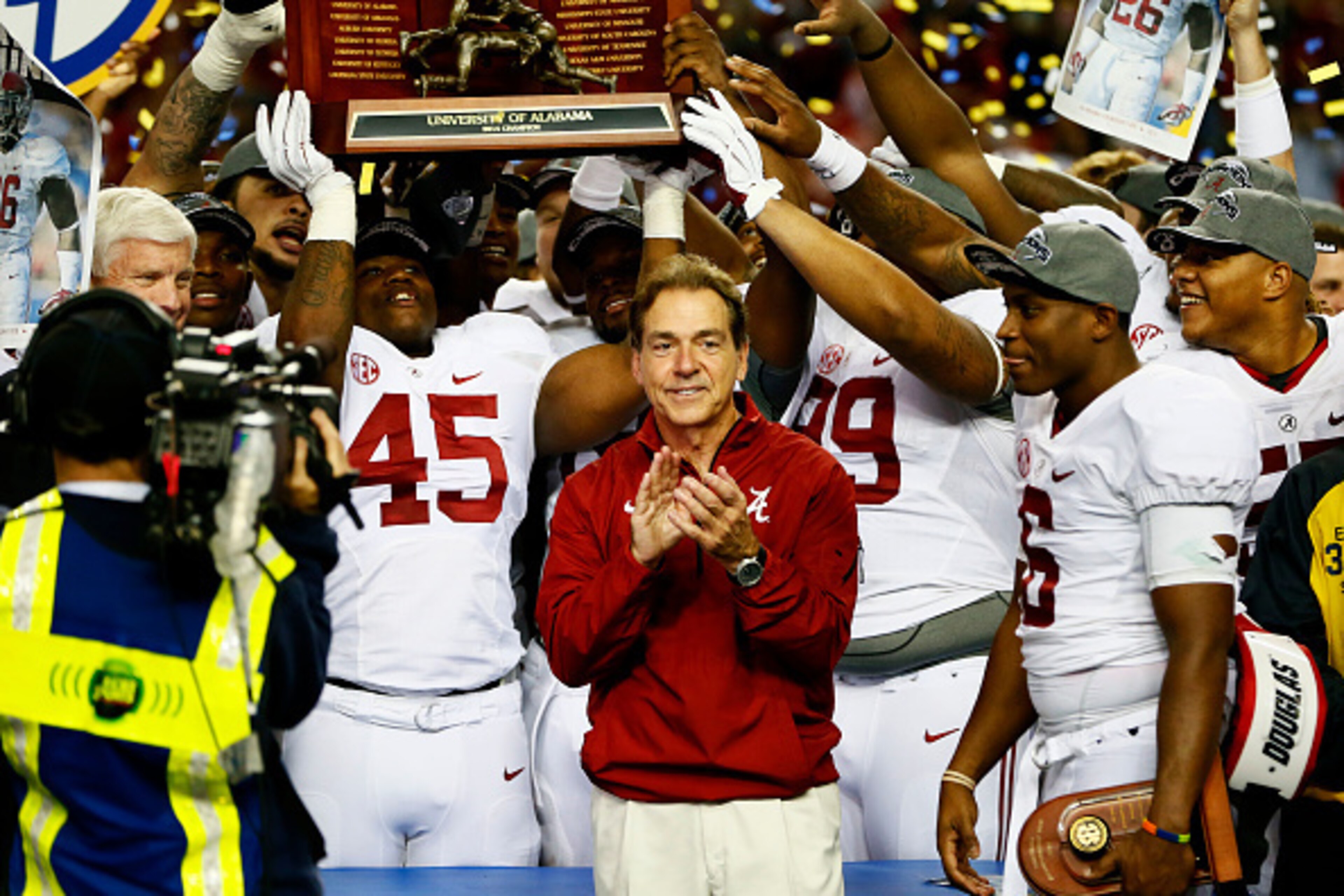 ATLANTA, GA - DECEMBER 06:  Head coach Nick Saban, Blake Sims #6 and the Alabama Crimson Tide celebrate their 42 to 13 win over the Missouri Tigers in the SEC Championship game at the Georgia Dome on December 6, 2014 in Atlanta, Georgia.  (Photo by Kevin 