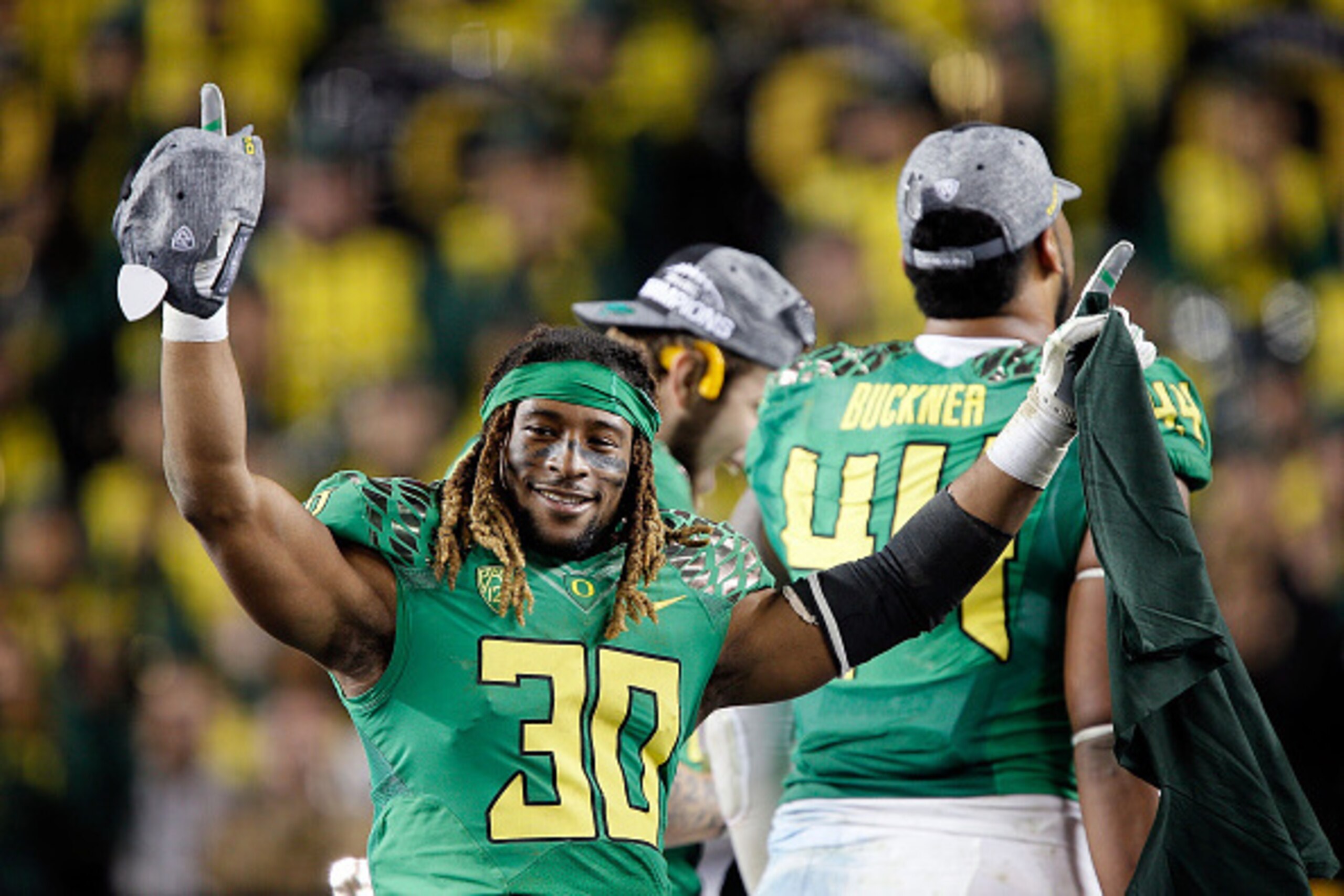 SANTA CLARA, CA - DECEMBER 05:  Ayele Forde #30 of the Oregon Ducks celebrate their PAC-12 victory against the Arizona Wildcats at Levi's Stadium on December 5, 2014 in Santa Clara, California.  (Photo by Brian Bahr/Getty Images)