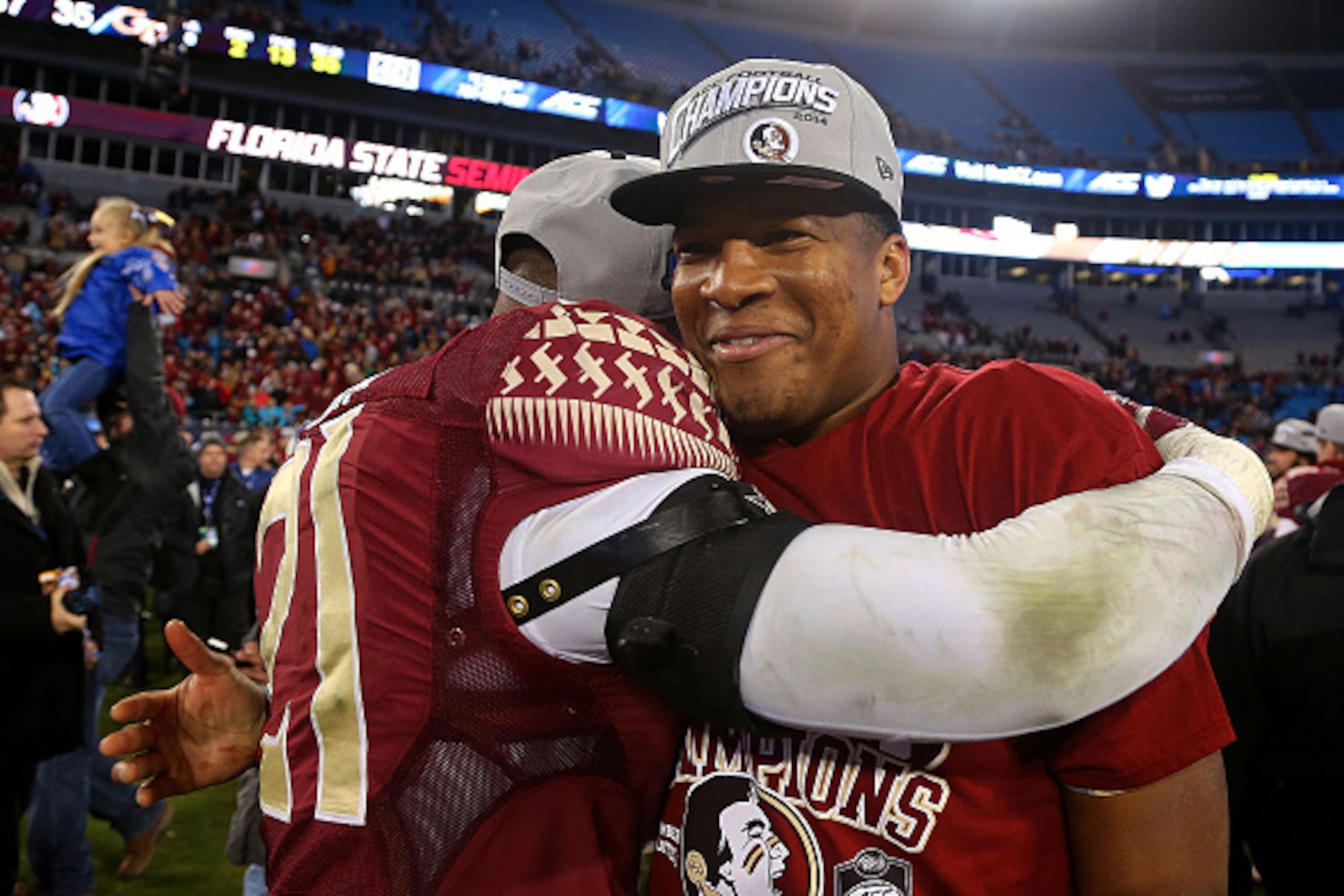 CHARLOTTE, NC - DECEMBER 06:  Jameis Winston #5 of the Florida State Seminoles celebrates after their 37-35 victory over the Georgia Tech Yellow Jackets at the ACC Championship game on December 6, 2014 in Charlotte, North Carolina.  (Photo by Mike Ehrmann