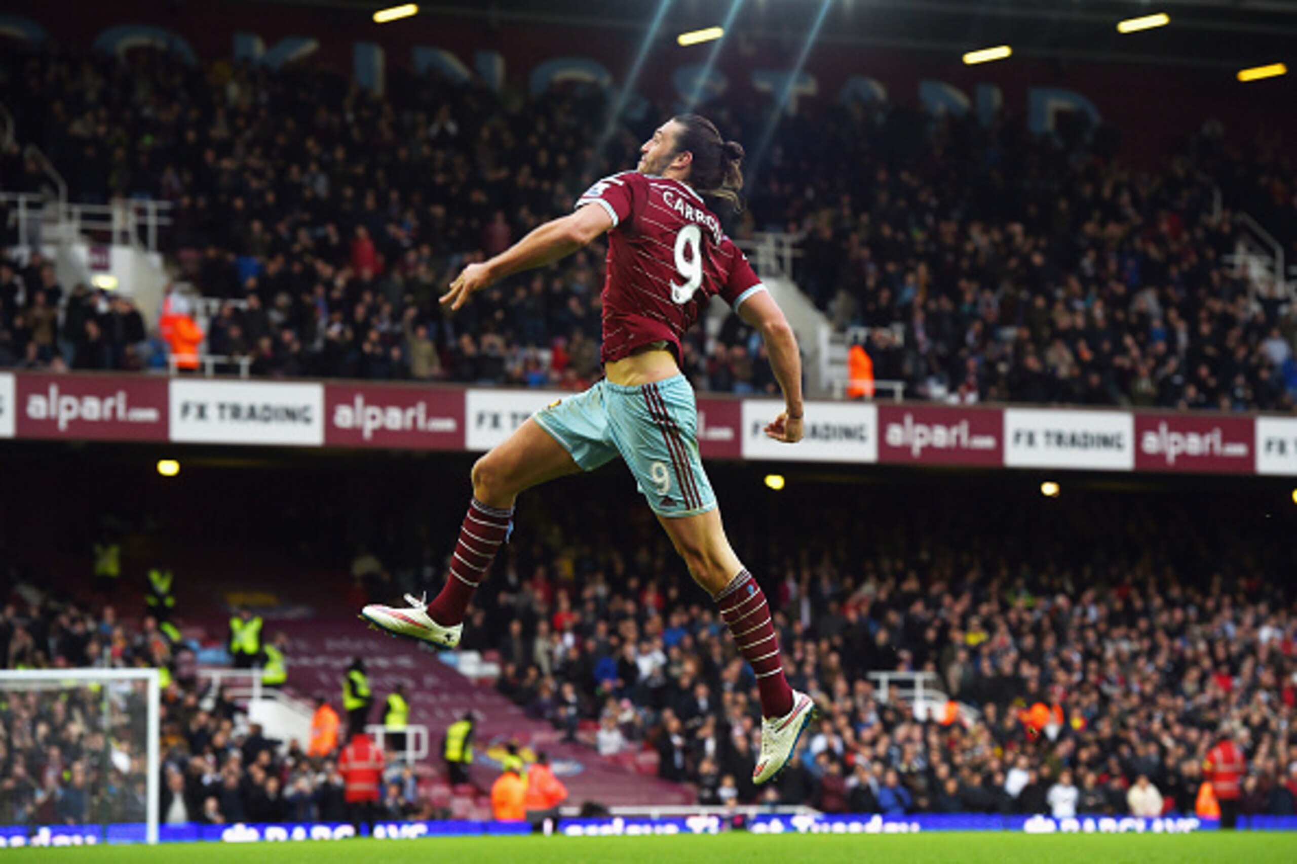 LONDON, ENGLAND - DECEMBER 07: Andy Carroll of West Ham celebrates scoring their second goal during the Barclays Premier League match between West Ham United and Swansea City at Boleyn Ground on December 7, 2014 in London, England. (Photo by Michael Re LONDON, ENGLAND - DECEMBER 07: Andy Carroll of West Ham celebrates scoring their second goal during the Barclays Premier League match between West Ham United and Swansea City at Boleyn Ground on December 7, 2014 in London, England. (Photo by Michael Re