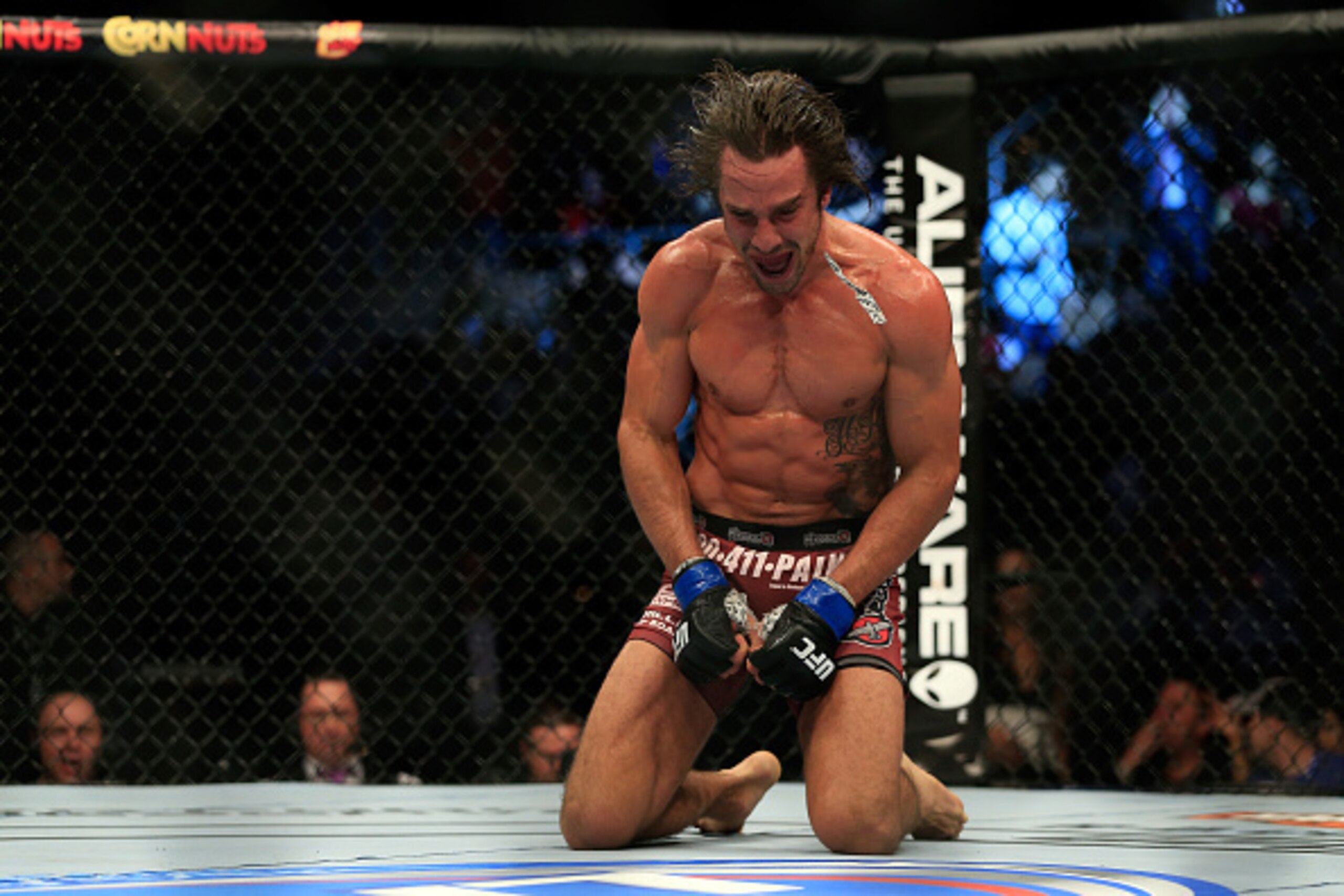 LAS VEGAS, NV - DECEMBER 06:  Josh Samman reacts after knocking out  Eddie Gordon in their fight during the UFC 181 event at the Mandalay Bay Events Center on December 6, 2014 in Las Vegas, Nevada.  (Photo by Alex Trautwig/Getty Images)