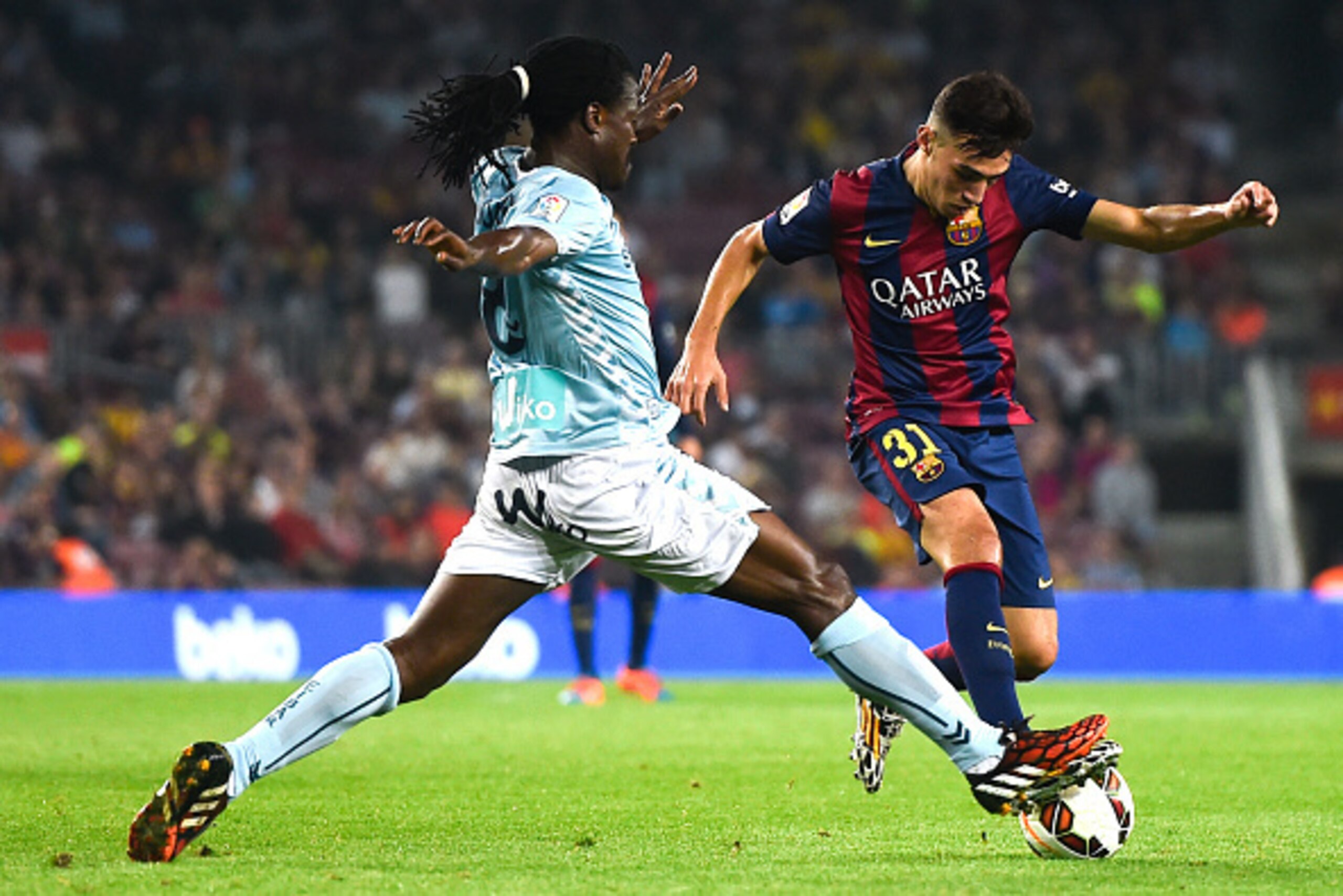 BARCELONA, SPAIN - OCTOBER 18: Munir El Haddadi of FC Barcelona duels for the ball with Derek Boateng of SD Eibar during the La Liga match between FC Barcelona and SD Eibar at Camp Nou on October 18, 2014 in Barcelona, Spain. (Photo by David Ramos/Getty BARCELONA, SPAIN - OCTOBER 18: Munir El Haddadi of FC Barcelona duels for the ball with Derek Boateng of SD Eibar during the La Liga match between FC Barcelona and SD Eibar at Camp Nou on October 18, 2014 in Barcelona, Spain. (Photo by David Ramos/Getty