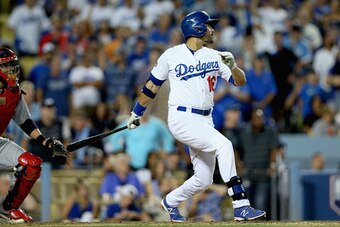 LOS ANGELES, CA - OCTOBER 03:  Andre Ethier #16 of the Los Angeles Dodgers hits a a double in the ninth inning against the St. Louis Cardinals during Game One of the National League Division Series at Dodger Stadium on October 3, 2014 in Los Angeles, Cali