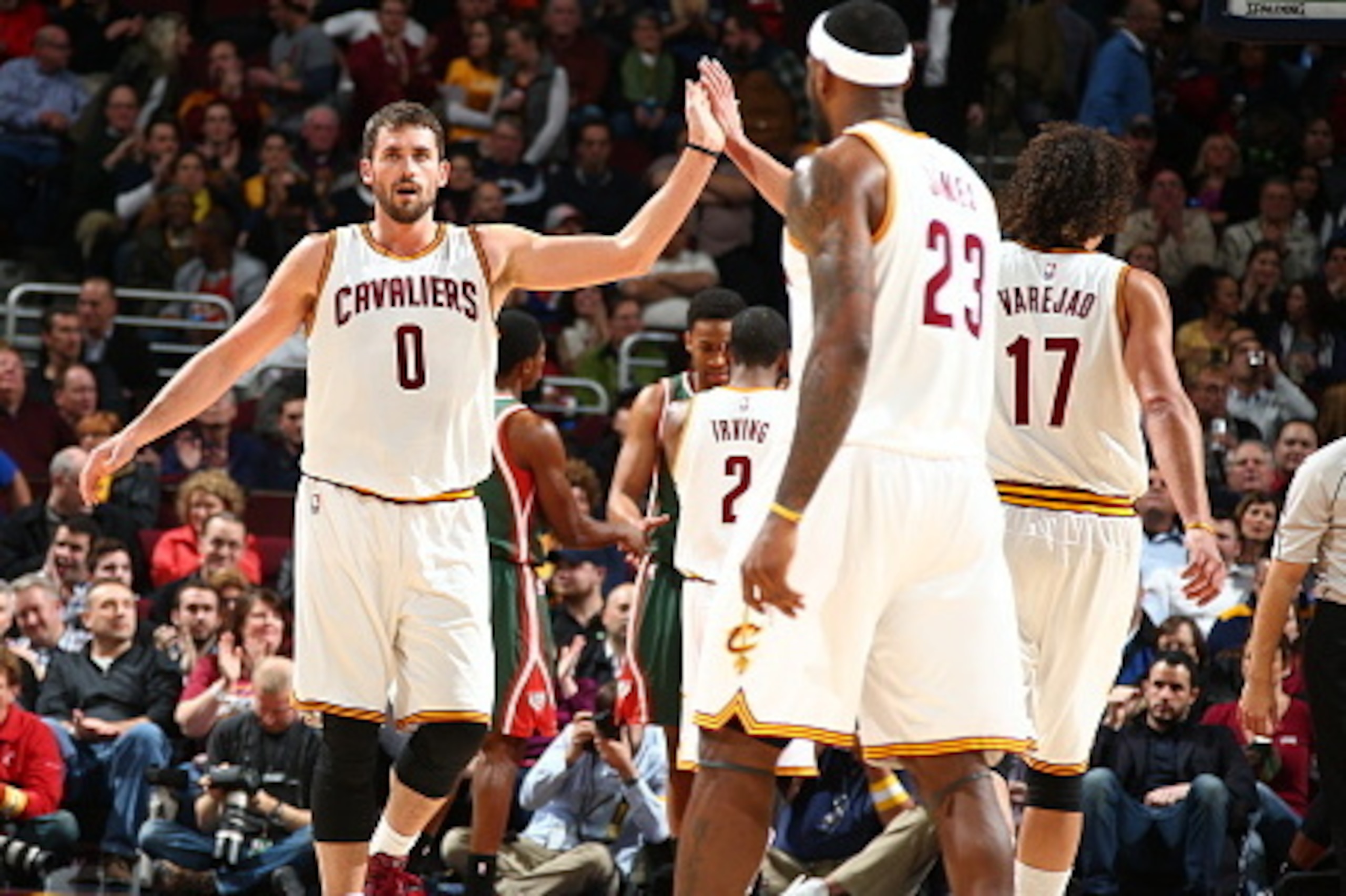 CLEVELAND, OH - DECEMBER 2:  Kevin Love #0 of the Cleveland Cavaliers celebrates against the Milwaukee Bucks during the game on December 2, 2014 at Quicken Loans Arena in Cleveland. Ohio.  NOTE TO USER: User expressly acknowledges and agrees that, by down