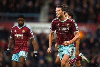 LONDON, ENGLAND - DECEMBER 07:  Andy Carroll of West Ham celebrates scoring their second goal  during the Barclays Premier League match between West Ham United and Swansea City at Boleyn Ground on December 7, 2014 in London, England.  (Photo by Michael Re