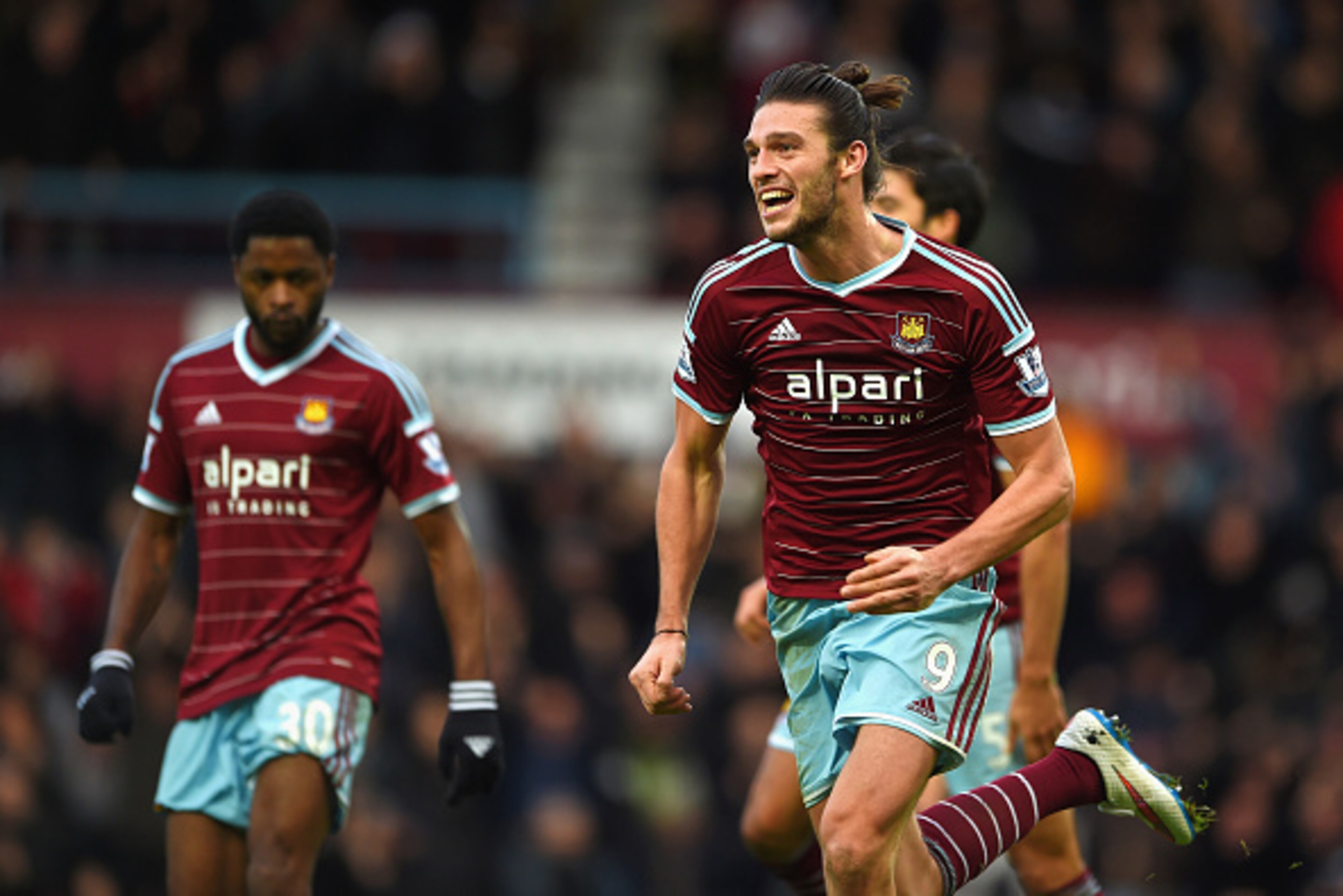 LONDON, ENGLAND - DECEMBER 07:  Andy Carroll of West Ham celebrates scoring their second goal  during the Barclays Premier League match between West Ham United and Swansea City at Boleyn Ground on December 7, 2014 in London, England.  (Photo by Michael Re