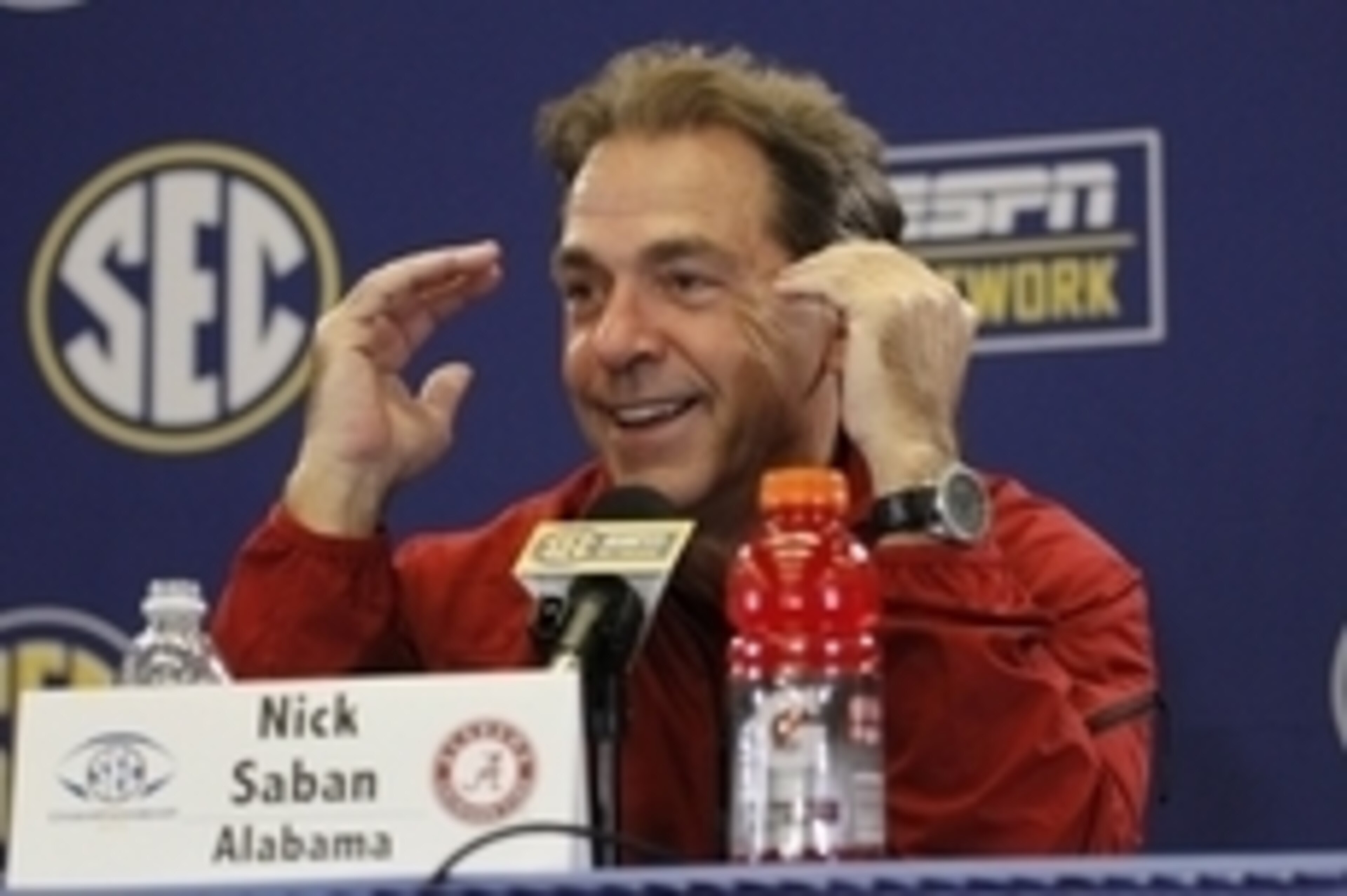 Dec 6, 2014; Atlanta, GA, USA; Alabama Crimson Tide head coach Nick Saban smiles as he addresses the media following their 42-13 win over the Missouri Tigers in the 2014 SEC Championship Game at the Georgia Dome. Mandatory Credit: Brett Davis-USA TODAY Sp