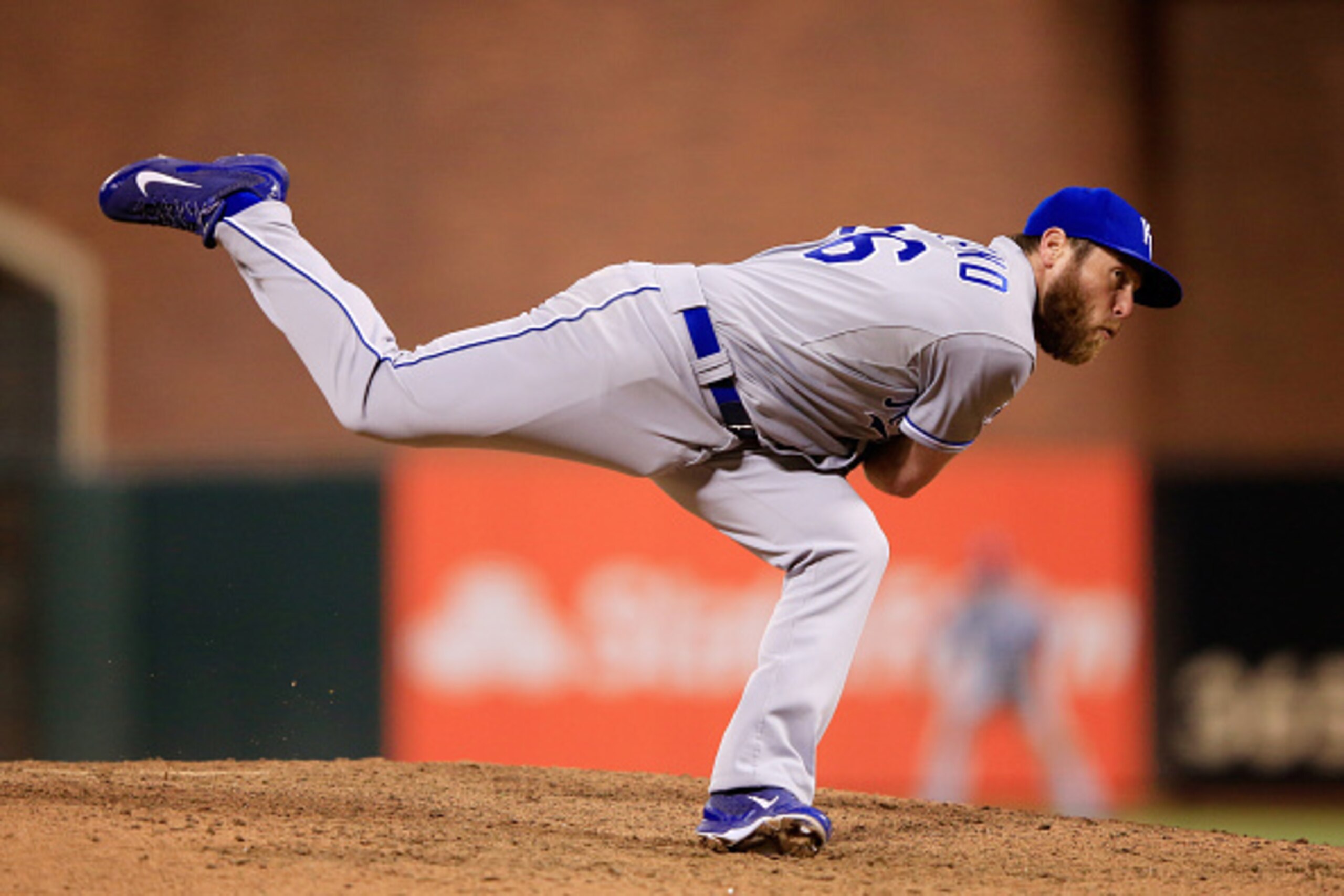 SAN FRANCISCO, CA - OCTOBER 24:  Greg Holland #56 of the Kansas City Royals pitches in the ninth inning against the San Francisco Giants during Game Three of the 2014 World Series at AT&T Park on October 24, 2014 in San Francisco, California.  (Photo by J