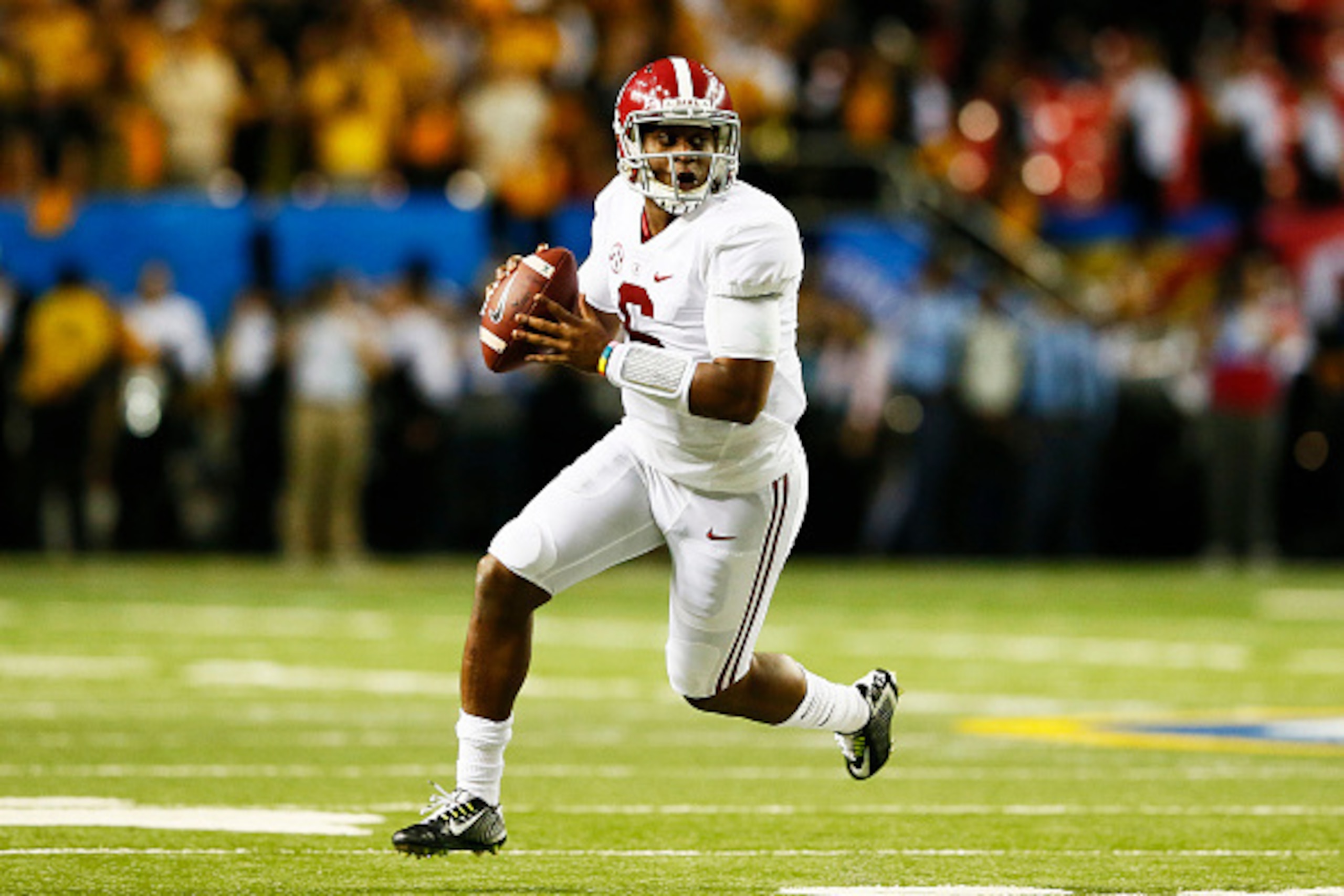 ATLANTA, GA - DECEMBER 06:  Blake Sims #6 of the Alabama Crimson Tide scrambles against the Missouri Tigers in the second half of the SEC Championship game at the Georgia Dome on December 6, 2014 in Atlanta, Georgia.  (Photo by Kevin C. Cox/Getty Images)