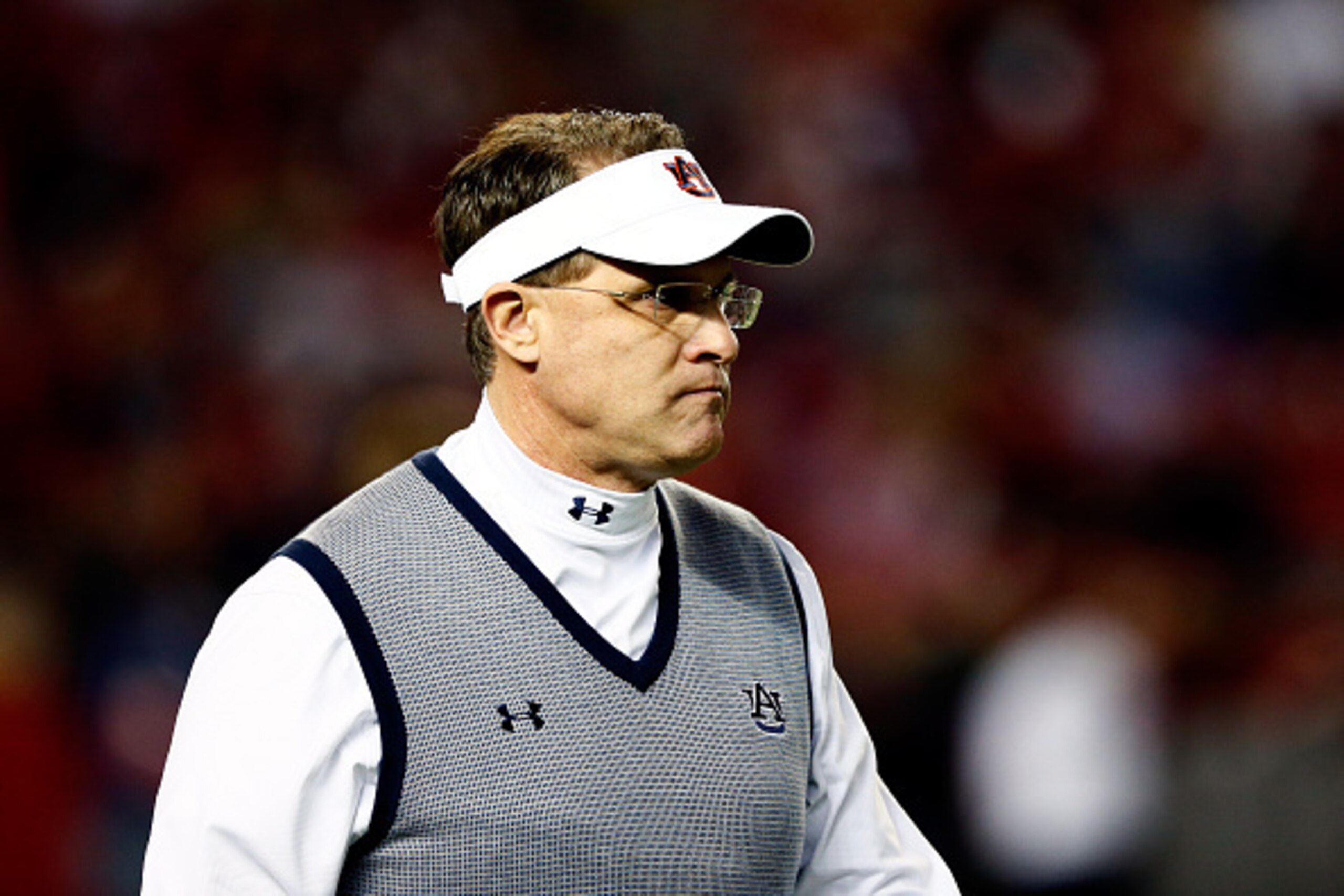 TUSCALOOSA, AL - NOVEMBER 29:  Head coach Gus Malzahn of the Auburn Tigers  looks on from the field prior to the Iron Bowl against the Alabama Crimson Tide at Bryant-Denny Stadium on November 29, 2014 in Tuscaloosa, Alabama.  (Photo by Kevin C. Cox/Getty