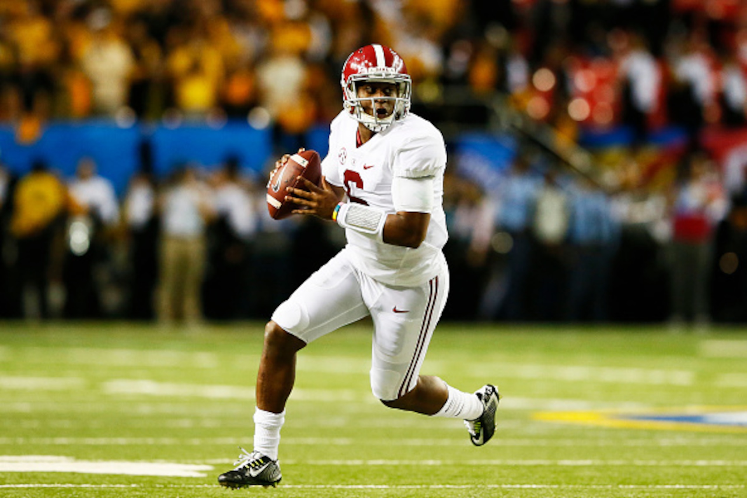 ATLANTA, GA - DECEMBER 06: Blake Sims #6 of the Alabama Crimson Tide scrambles against the Missouri Tigers in the second half of the SEC Championship game at the Georgia Dome on December 6, 2014 in Atlanta, Georgia. (Photo by Kevin C. Cox/Getty Images) ATLANTA, GA - DECEMBER 06: Blake Sims #6 of the Alabama Crimson Tide scrambles against the Missouri Tigers in the second half of the SEC Championship game at the Georgia Dome on December 6, 2014 in Atlanta, Georgia. (Photo by Kevin C. Cox/Getty Images)