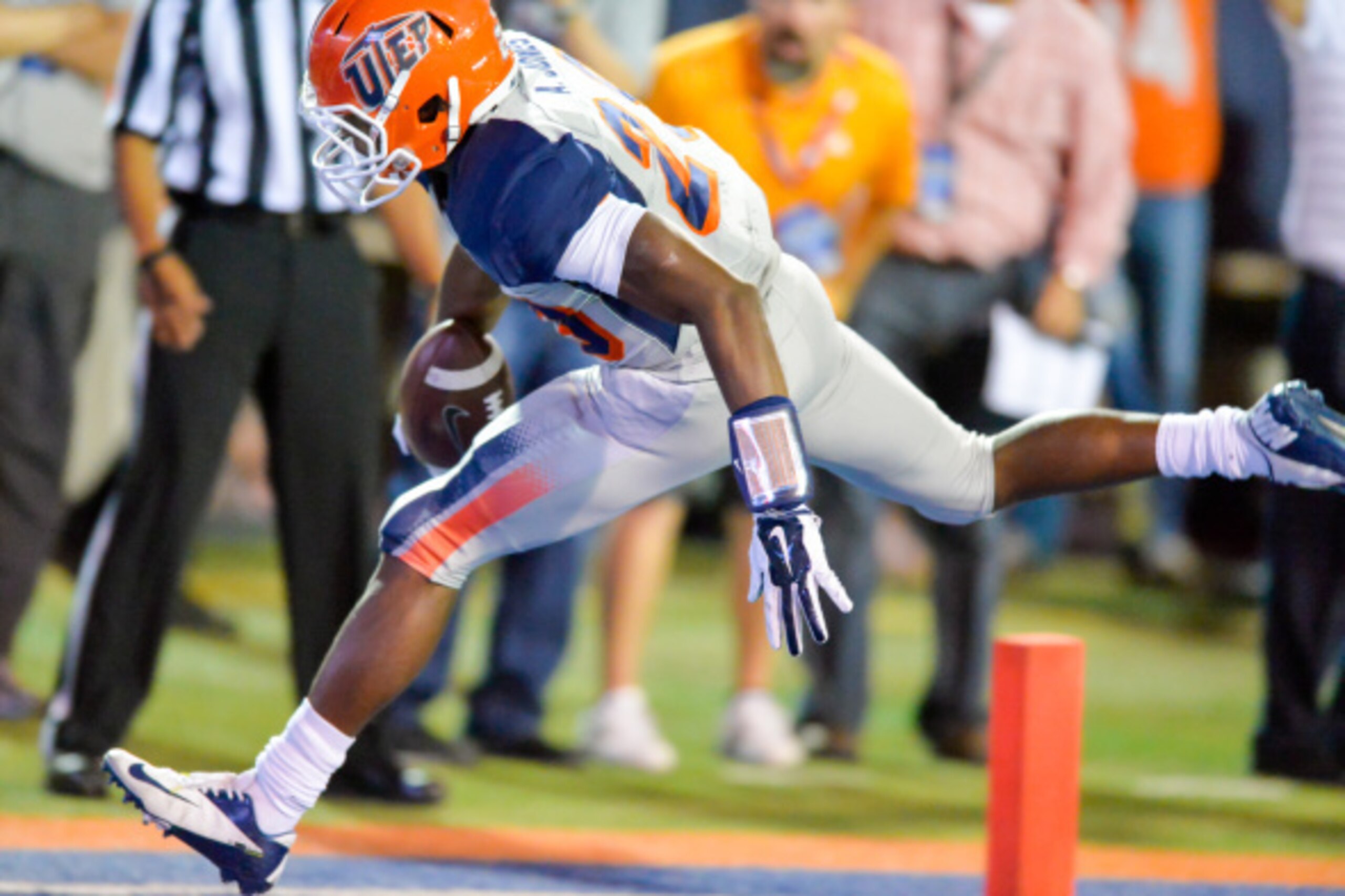 El PASO, TX -SEPTEMBER 6 :   Aaron Jones #29 of the UTEP Miners scores a touchdown against the Texas Tech Red Raiders on September 6, 2014 at the Sun Bowl in El Paso, Texas.  The Texas Tech Red Raiders defeated the UTEP Miners 30-26.  (Photo by John Weast