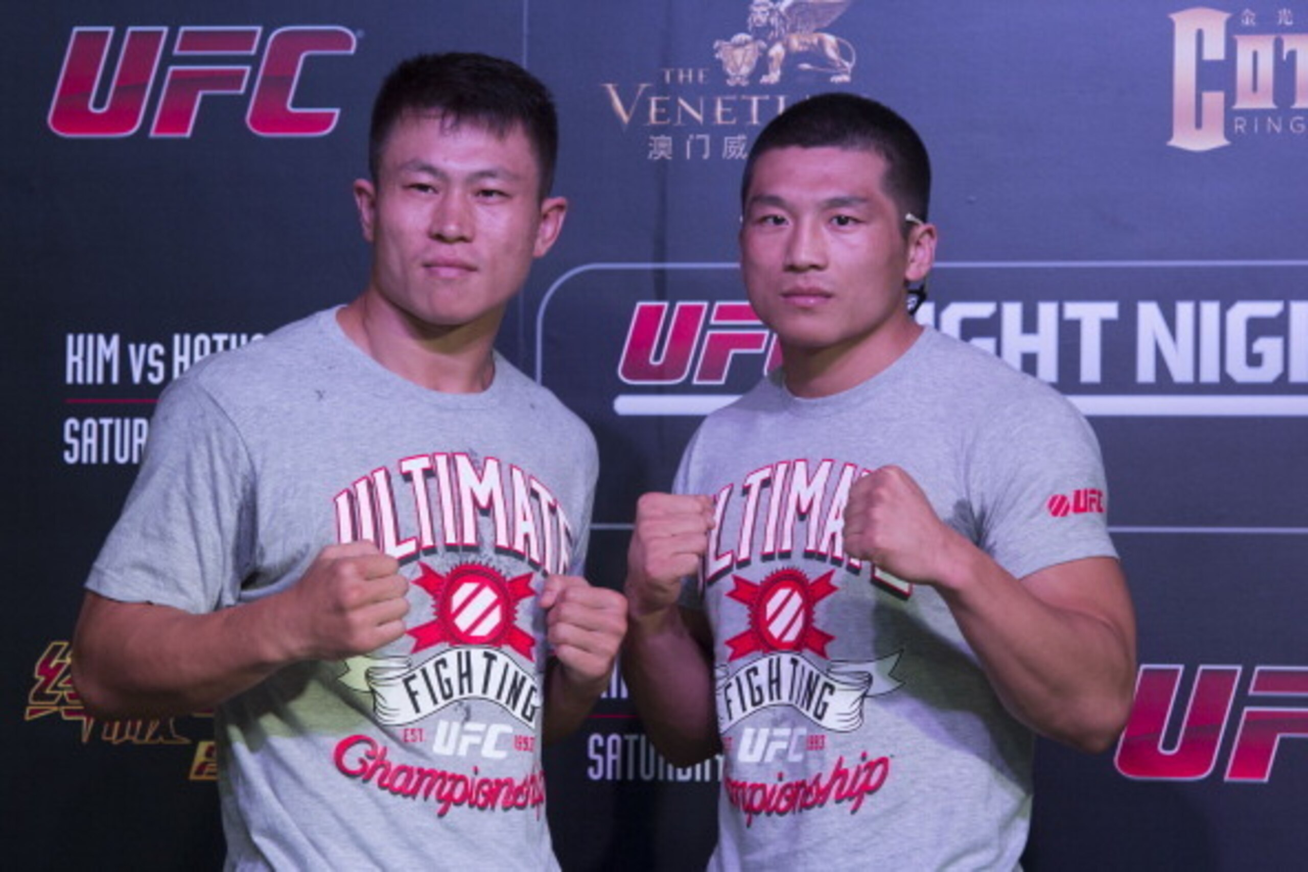 MACAU - FEBRUARY 27:  Zhang Lipeng (L) and Wang Sai of China (R) pose for media during the presentation of UFC Fight Night Macao Kim vs. Hathaway MEDIA DAY at Venetian Macau  on February 27, 2014 in Macau, Macau.  (Photo by Xaume Olleros/Zuffa LLC)