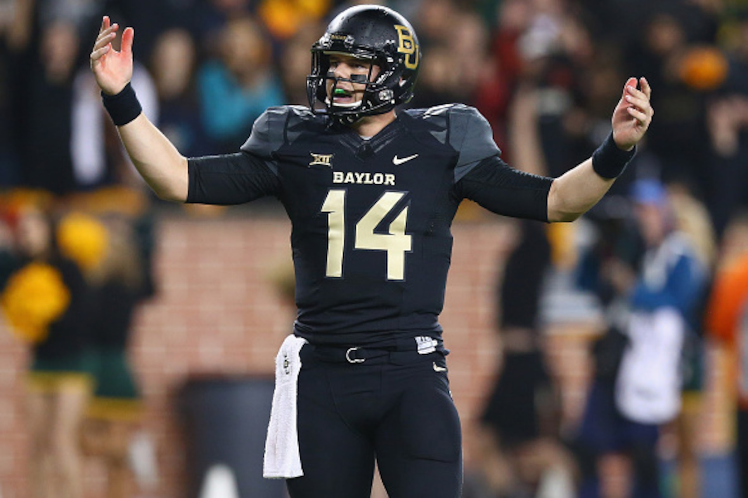 WACO, TX - NOVEMBER 22:  Bryce Petty #14 of the Baylor Bears at McLane Stadium on November 22, 2014 in Waco, Texas.  (Photo by Ronald Martinez/Getty Images)