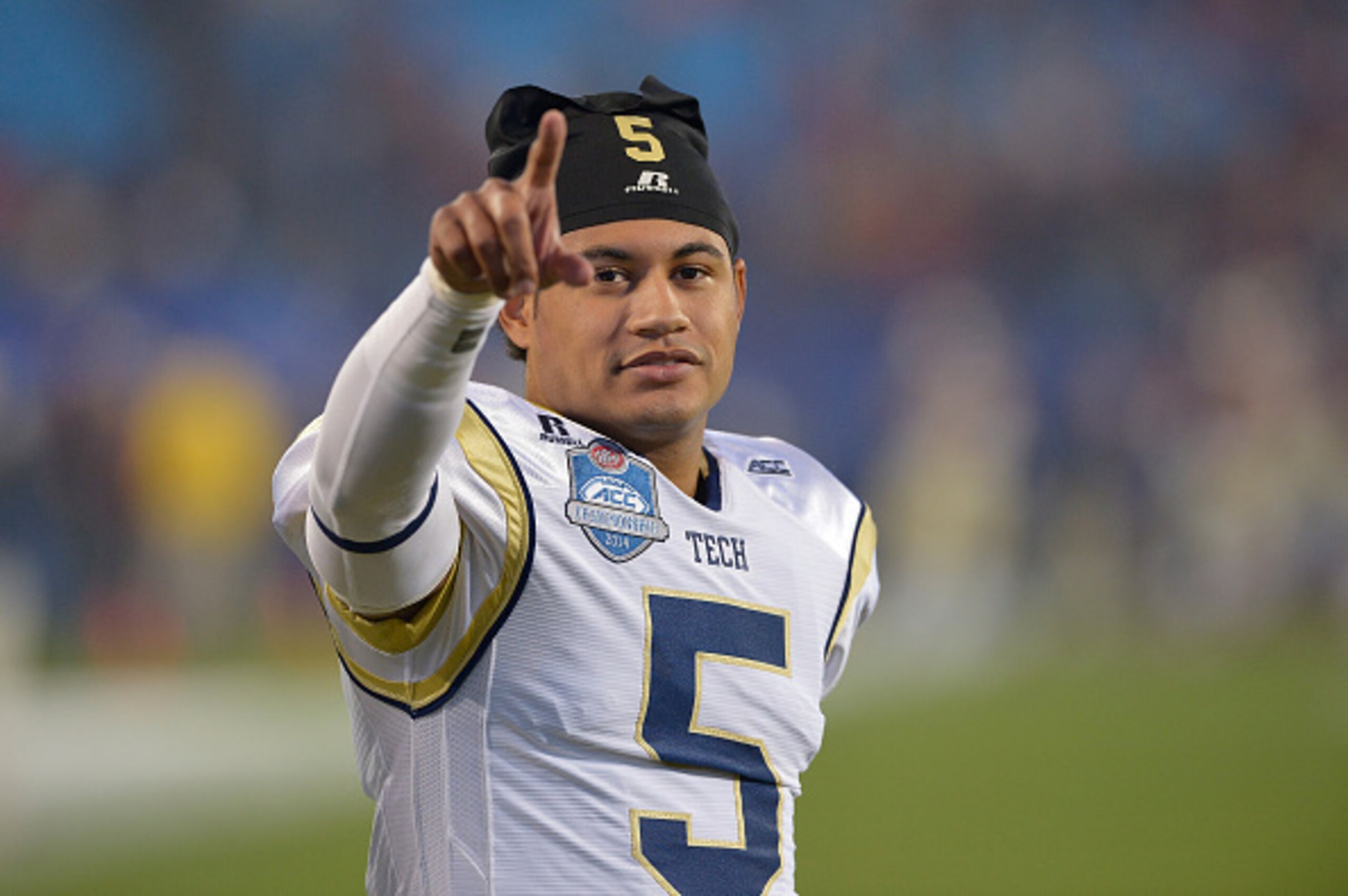 CHARLOTTE, NC - DECEMBER 06:  Justin Thomas #5 of the Georgia Tech Yellow Jackets waves to the fans during the Atlantic Coast Conference championship game against the Florida State Seminoles on December 6, 2014 at Bank of America Stadium in Greenville, No