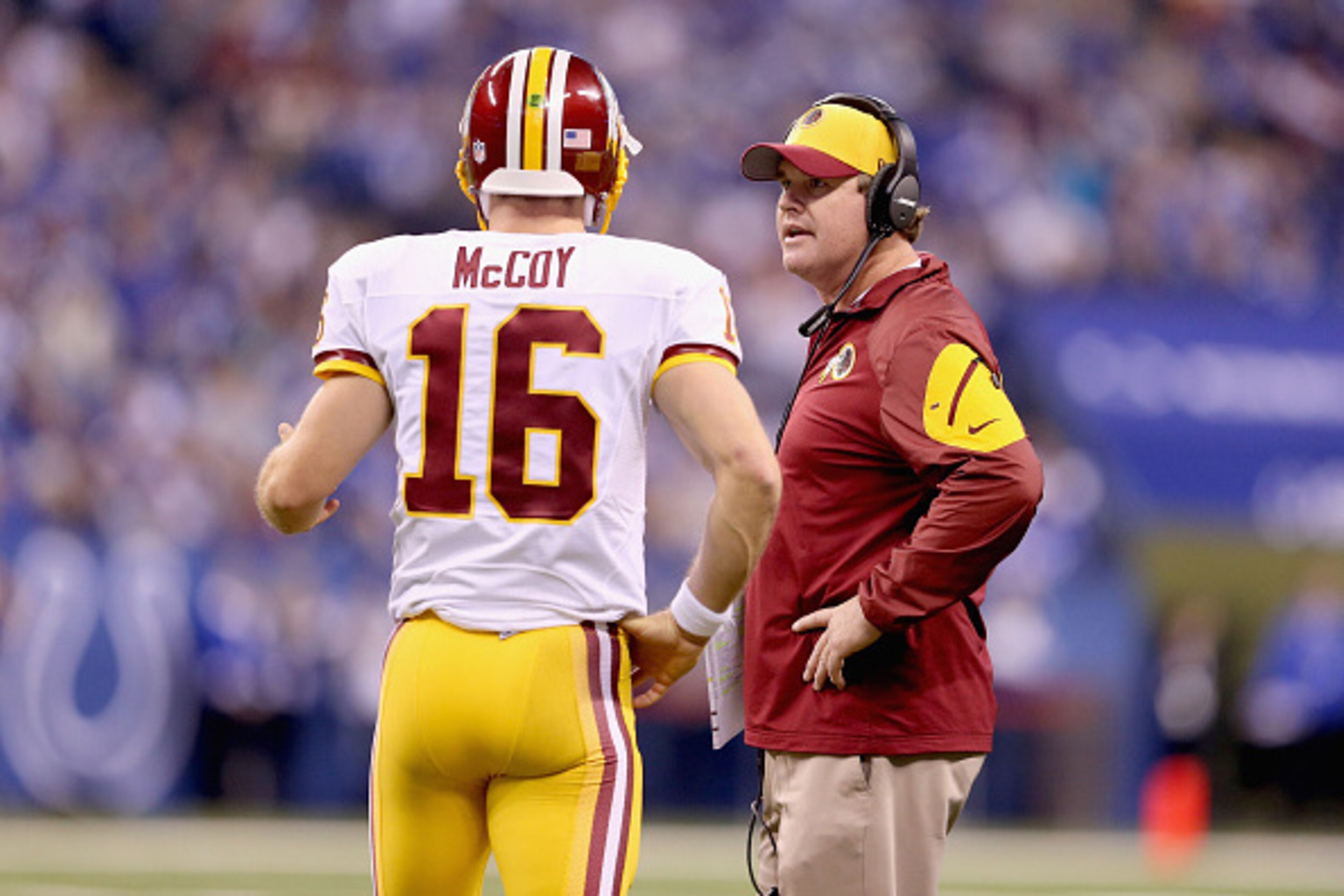 INDIANAPOLIS, IN - NOVEMBER 30: Jay Gruden the head coach talks with Colt McCoy #16 of the Washington Redskins during the game against the Indianapolis Colts at Lucas Oil Stadium on November 30, 2014 in Indianapolis, Indiana.  (Photo by Andy Lyons/Getty I