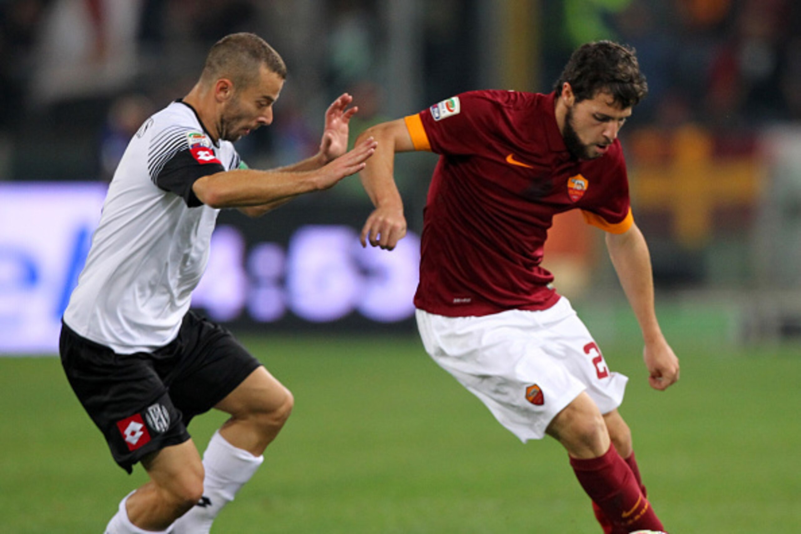 ROME, ITALY - OCTOBER 29: Mattia Destro (R) of AS Roma competes for the ball with Giuseppe De Feudis of AC Cesena during the Serie A match between AS Roma and AC Cesena at Stadio Olimpico on October 29, 2014 in Rome, Italy.  (Photo by Paolo Bruno/Getty Im