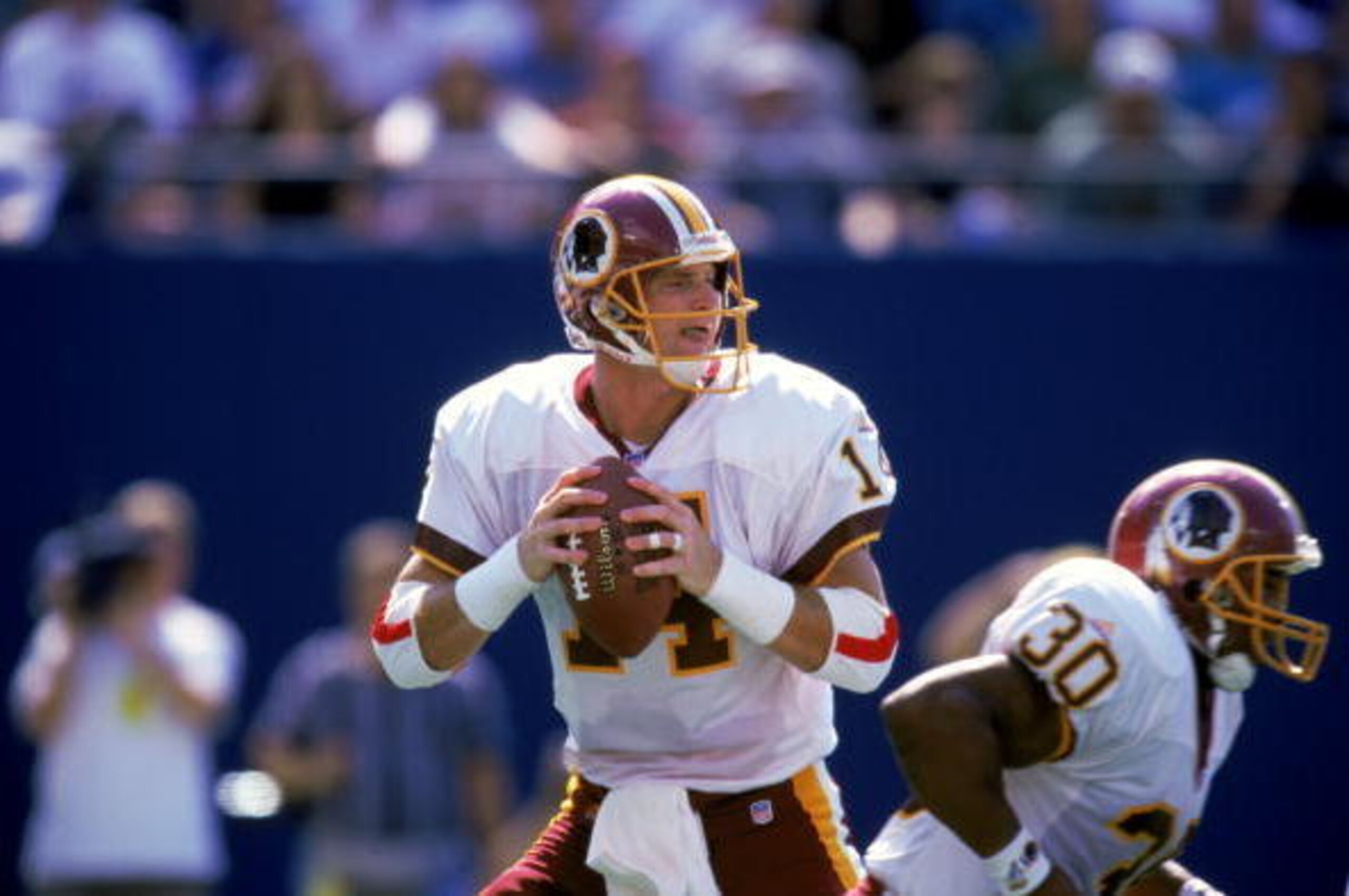 19 Sep 1999:  Brad Johnson #14 of the Washington Redskins gets ready to pass the ball during the game against the New York Giants at the Giants Stadium in East Rutherford, New Jersey. The Redskins defeated the Giants 50-21. Mandatory Credit: Ezra O. Shaw 