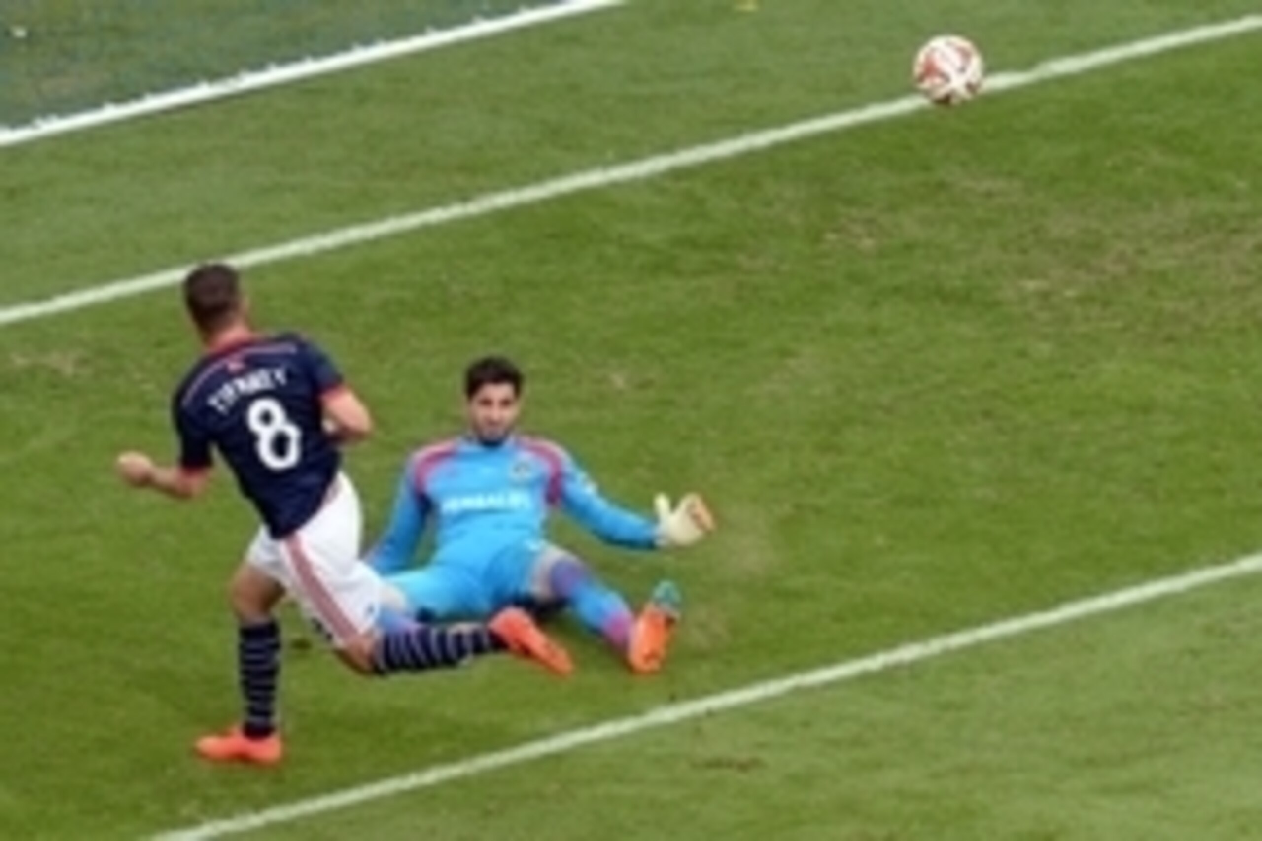 Dec 7, 2014; Los Angeles, CA, USA; New England Revolution player Chris Tierney (8) scores a goal past Los Angeles Galaxy goalkeeper Jaime Penedo (18) in the second half during the 2014 MLS Cup final at Stubhub Center. Mandatory Credit: Jayne Kamin-Oncea-U