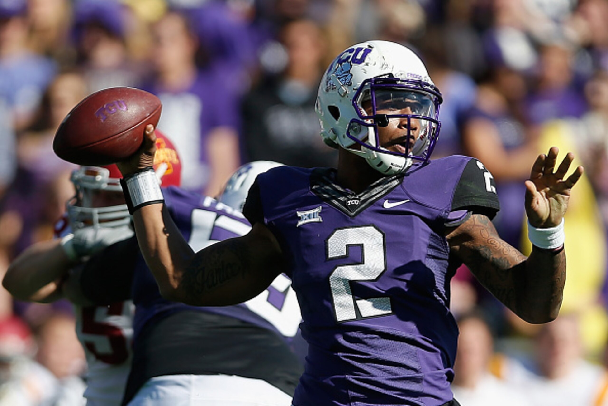 FORT WORTH, TX - DECEMBER 06:  Quarterback Trevone Boykin #2 of the TCU Horned Frogs throws a pass during the thrid quarter of the Big 12 college football game against the Iowa State Cyclones at Amon G. Carter Stadium on December 6, 2014 in Fort Worth, Te