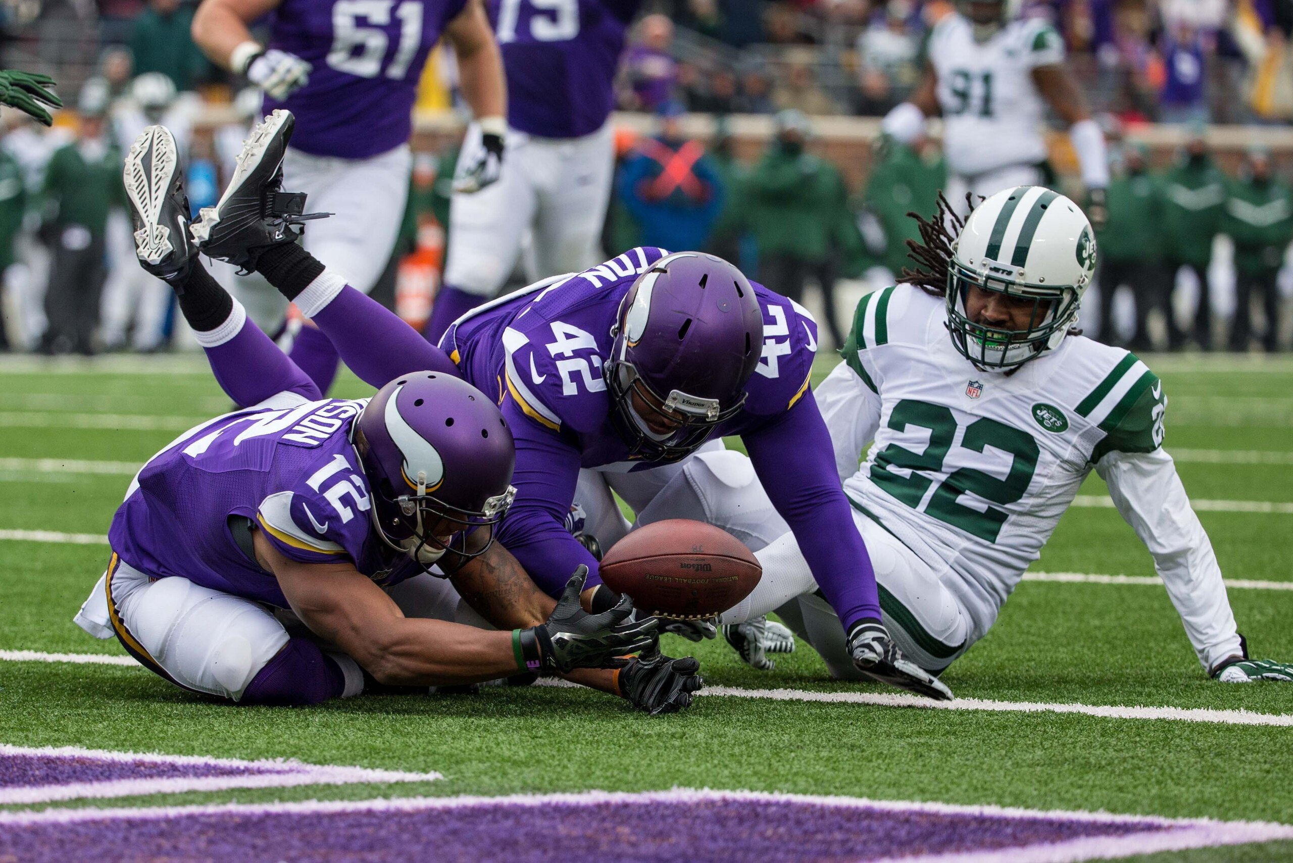 Dec 7, 2014; Minneapolis, MN, USA; Minnesota Vikings fullback Jerome Felton (42) recovers a fumble for a touchdown during the second quarter against the New York Jets at TCF Bank Stadium. Mandatory Credit: Brace Hemmelgarn-USA TODAY Sports