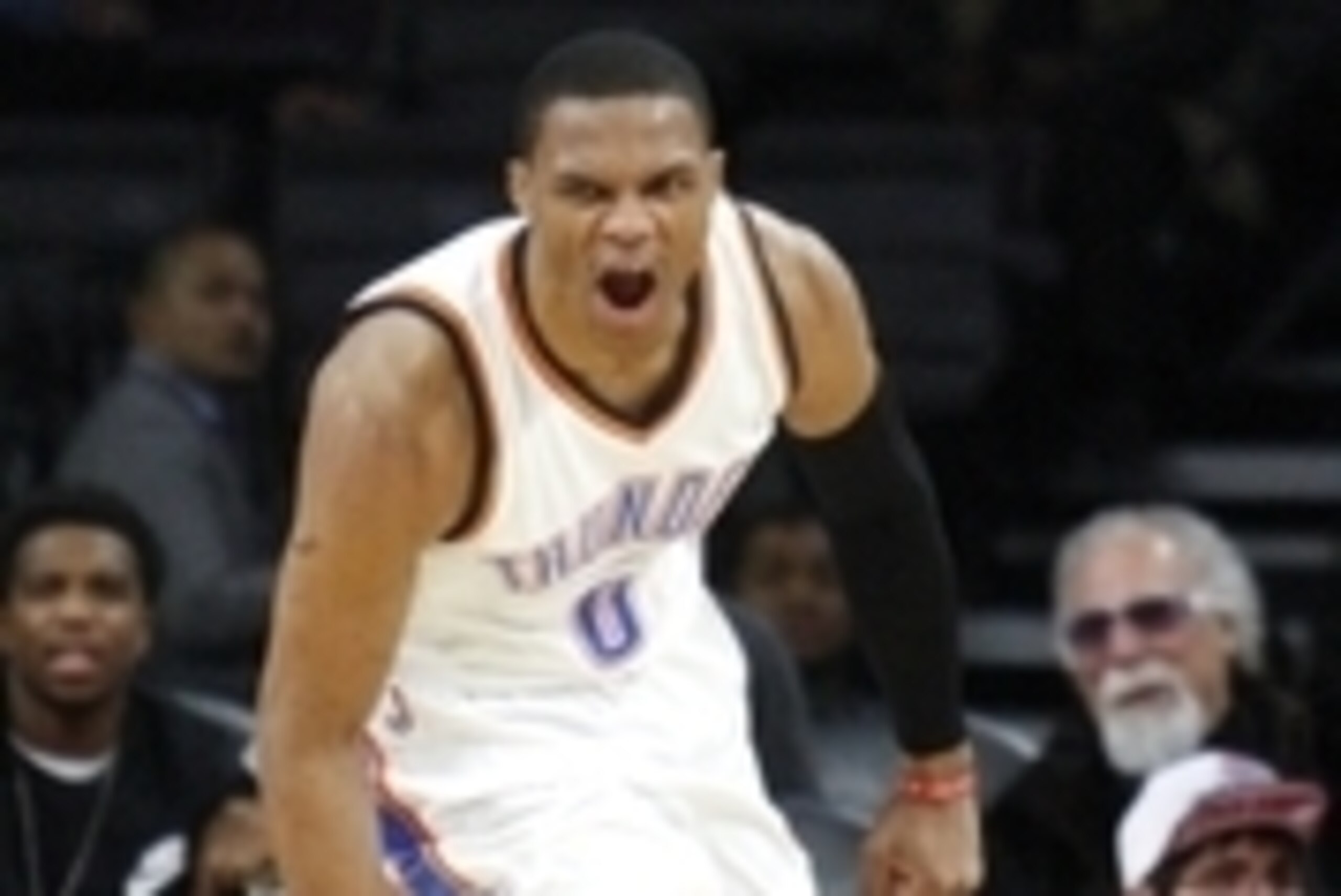 Dec 7, 2014; Auburn Hills, MI, USA; Oklahoma City Thunder guard Russell Westbrook (0) celebrates after a dunk during the fourth quarter against the Detroit Pistons at The Palace of Auburn Hills. The Thunder beat the Pistons 96-94. Mandatory Credit: Raj Me