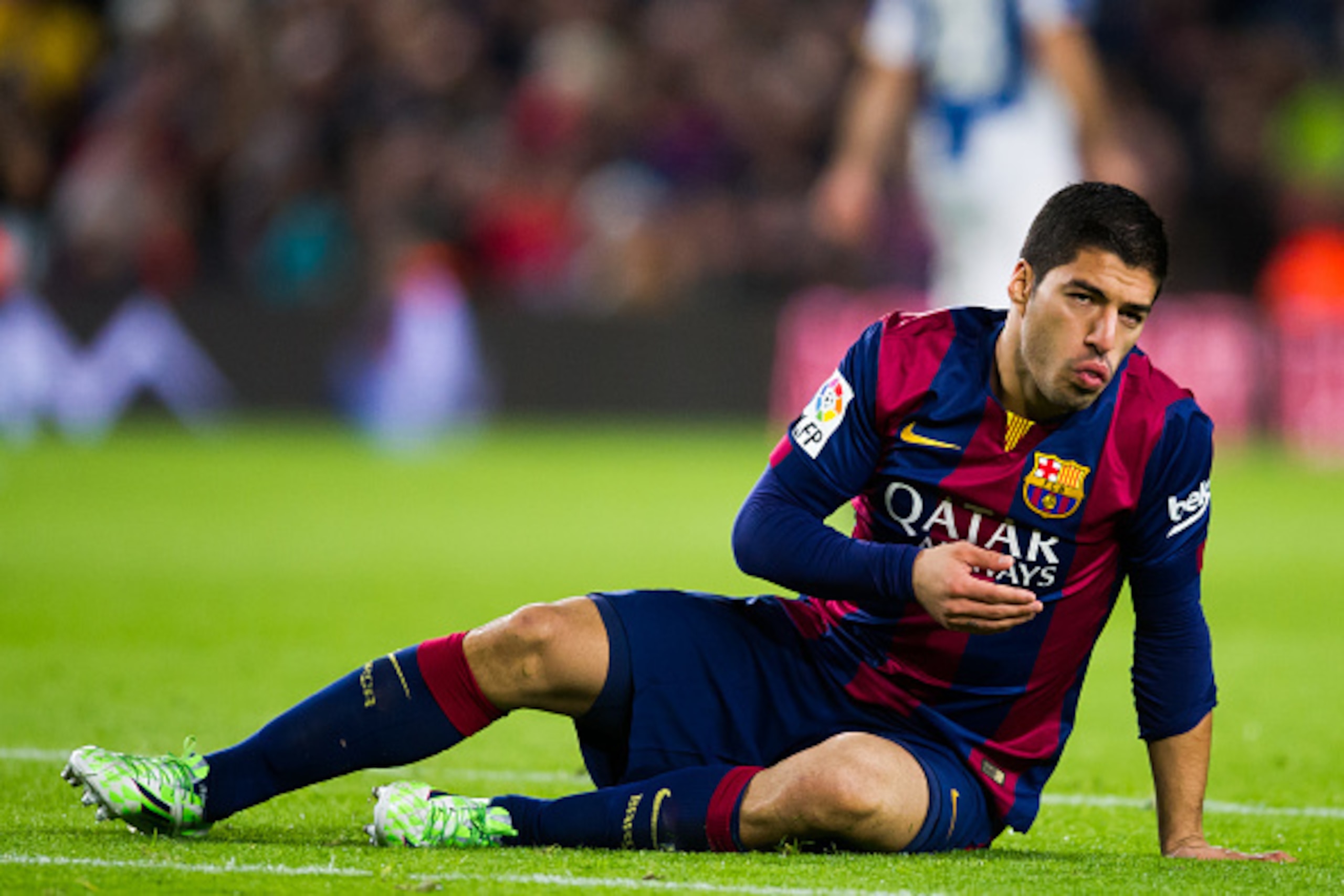 BARCELONA, SPAIN - DECEMBER 07: Luis Suarez of FC Barcelona reacts during the La Liga match between FC Barcelona and RCD Espanyol at Camp Nou on December 7, 2014 in Barcelona, Spain. (Photo by Alex Caparros/Getty Images)