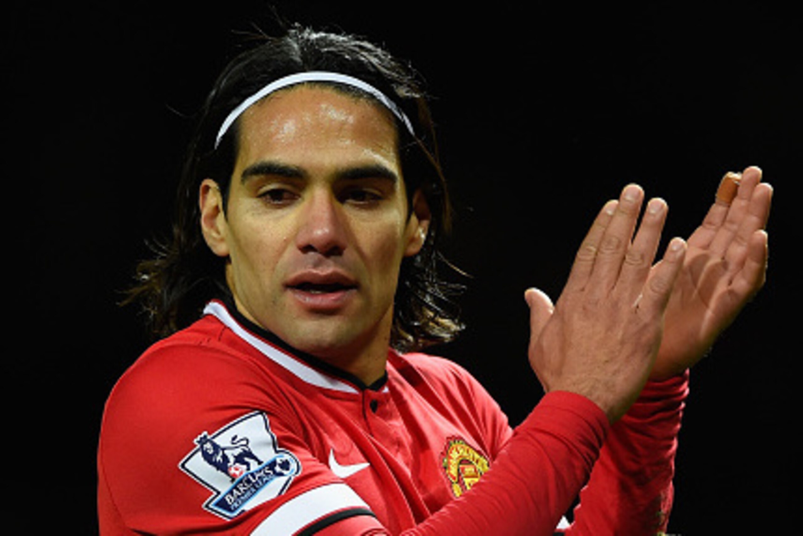 MANCHESTER, ENGLAND - DECEMBER 02:  Radamel Falcao of Manchester United applauds during the Barclays Premier League match between Manchester United and Stoke City at Old Trafford on December 2, 2014 in Manchester, England.  (Photo by Mike Hewitt/Getty Ima