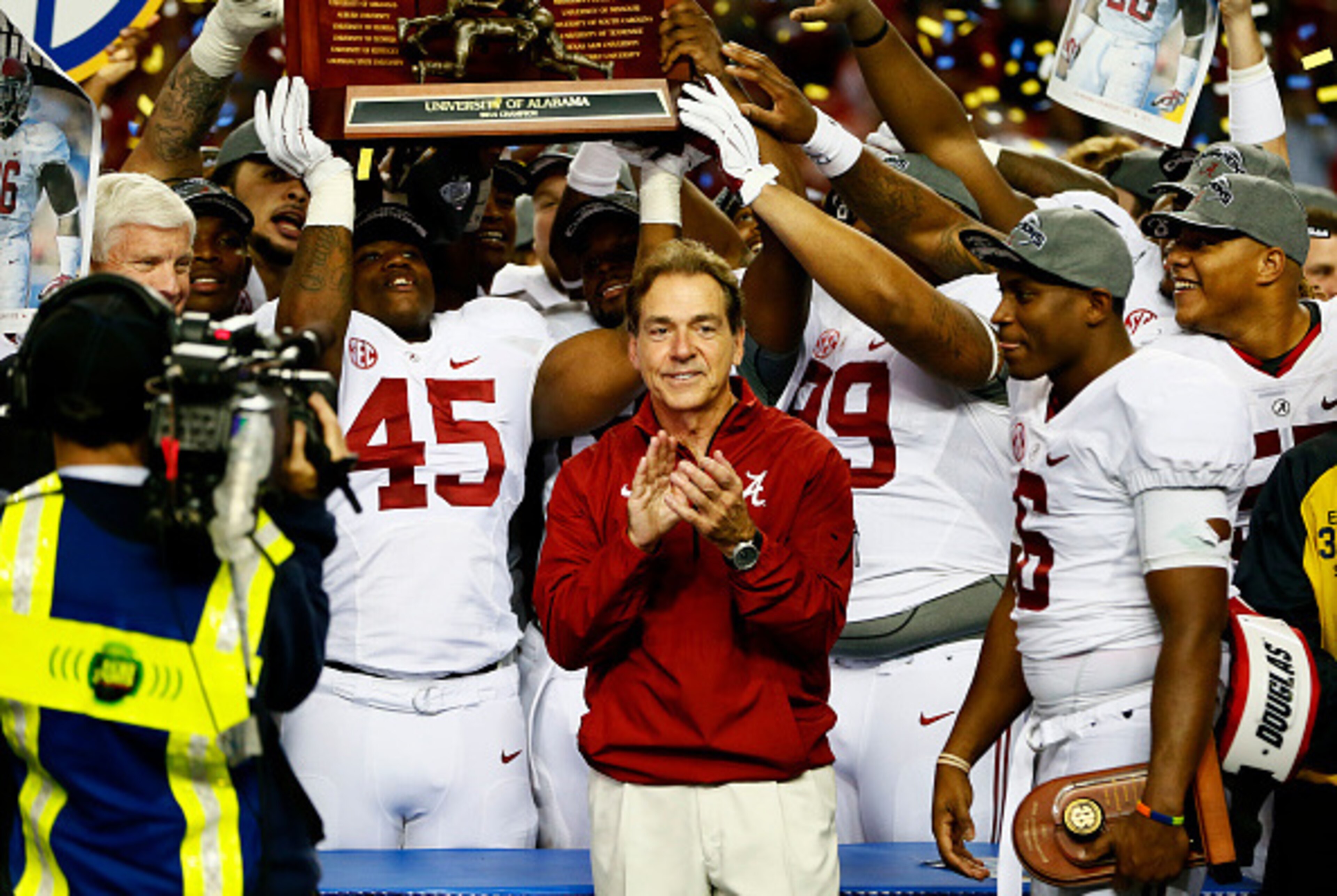 ATLANTA, GA - DECEMBER 06:  Head coach Nick Saban, Blake Sims #6 and the Alabama Crimson Tide celebrate their 42 to 13 win over the Missouri Tigers in the SEC Championship game at the Georgia Dome on December 6, 2014 in Atlanta, Georgia.  (Photo by Kevin 