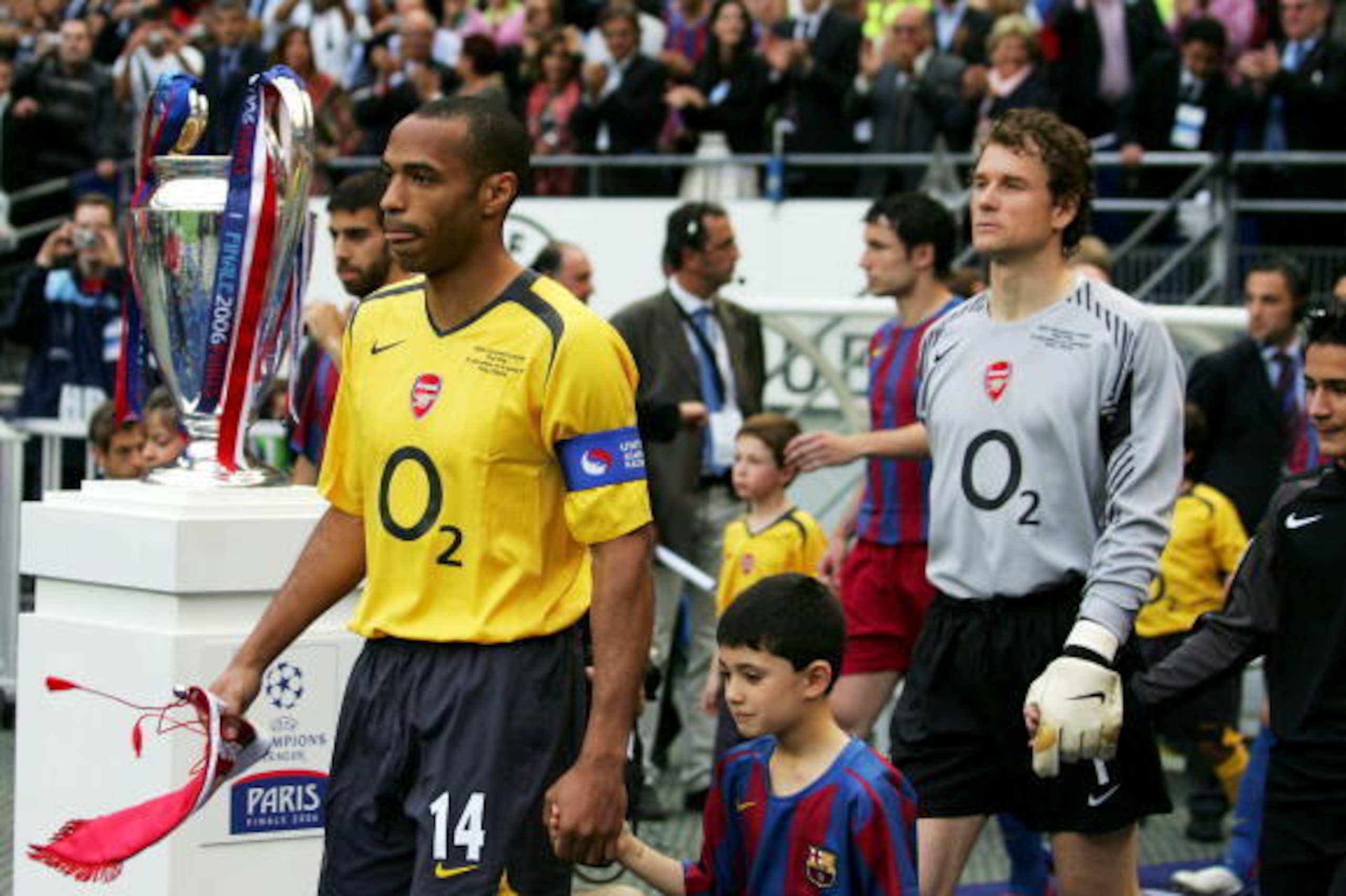 PARIS - MAY 17:  (L-R) Thierry Henry of Arsenal leads out Jens Lehmann and the rest of the Arsenal team before the UEFA Champions League Final between Arsenal and Barcelona at the Stade de France on May 17, 2006 in Paris, France.  (Photo by Shaun Botteril