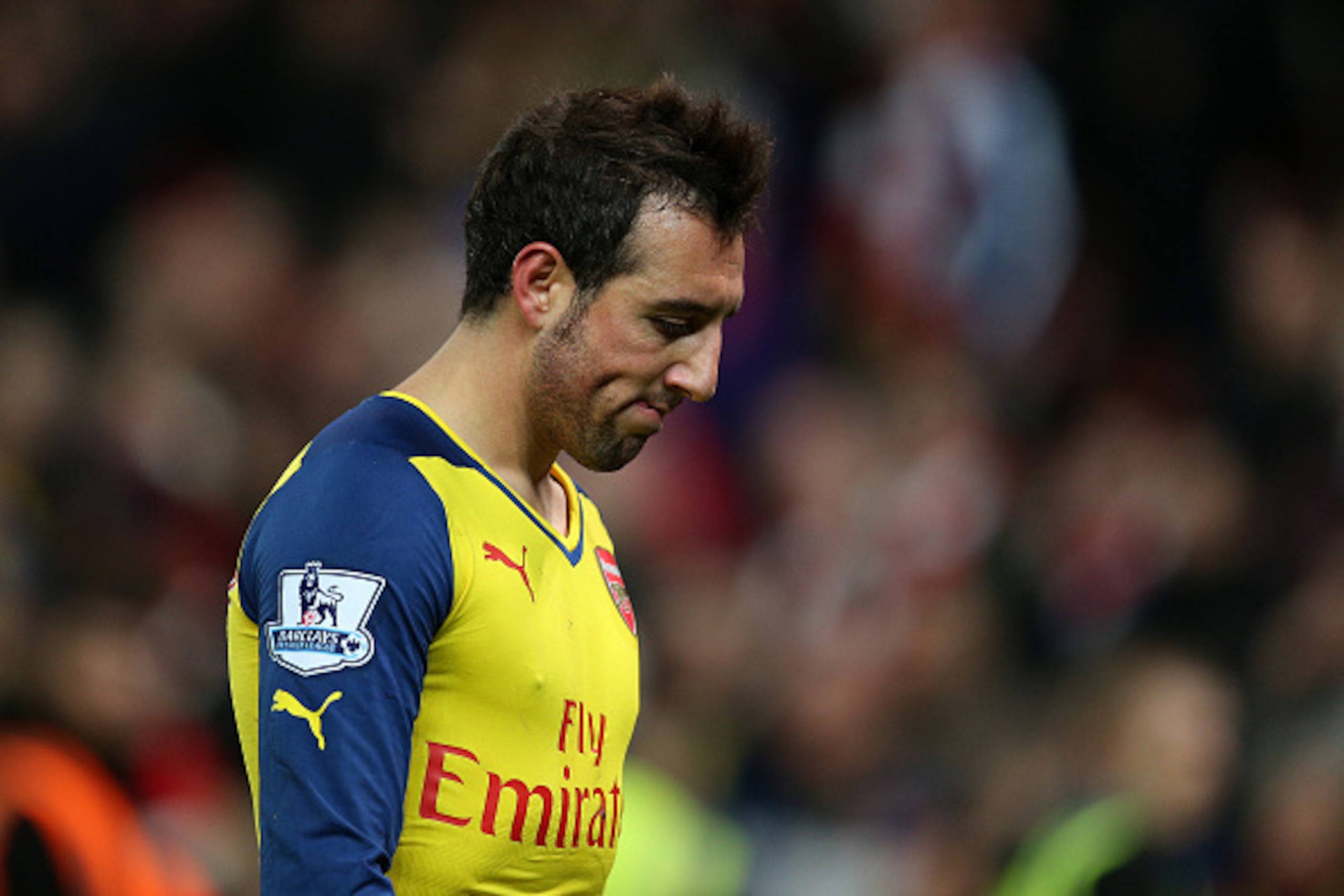 STOKE ON TRENT, ENGLAND - DECEMBER 06:  Santi Cazorla of Arsenal looks dejected at the end of the Barclays Premier League match between Stoke City and Arsenal  at the Britannia Stadium on December 6, 2014 in Stoke on Trent, England.  (Photo by Clive Mason