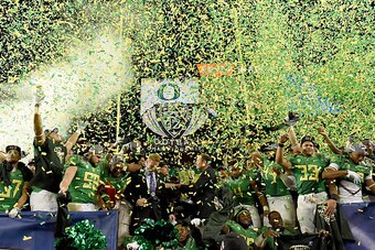 SANTA CLARA, CA - DECEMBER 05:  Oregon Ducks players celebrates winning the Pac-12 Championship game over the Arizona Wildcats at Levi's Stadium on December 5, 2014 in Santa Clara, California. The Ducks defeated the Wildcats 51-13.  (Photo by Thearon W. H