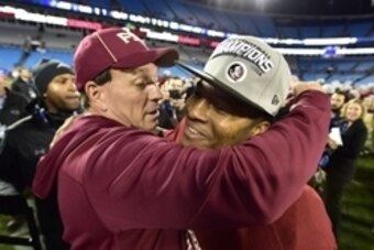 Dec 6, 2014; Charlotte, NC, USA; Florida State Seminoles head coach Jimbo Fisher with quarterback Jameis Winston (5) after the game. The Seminoles defeated the Georgia Tech Yellow Jackets 37-35 at Bank of America Stadium. Mandatory Credit: Bob Donnan-USA 
