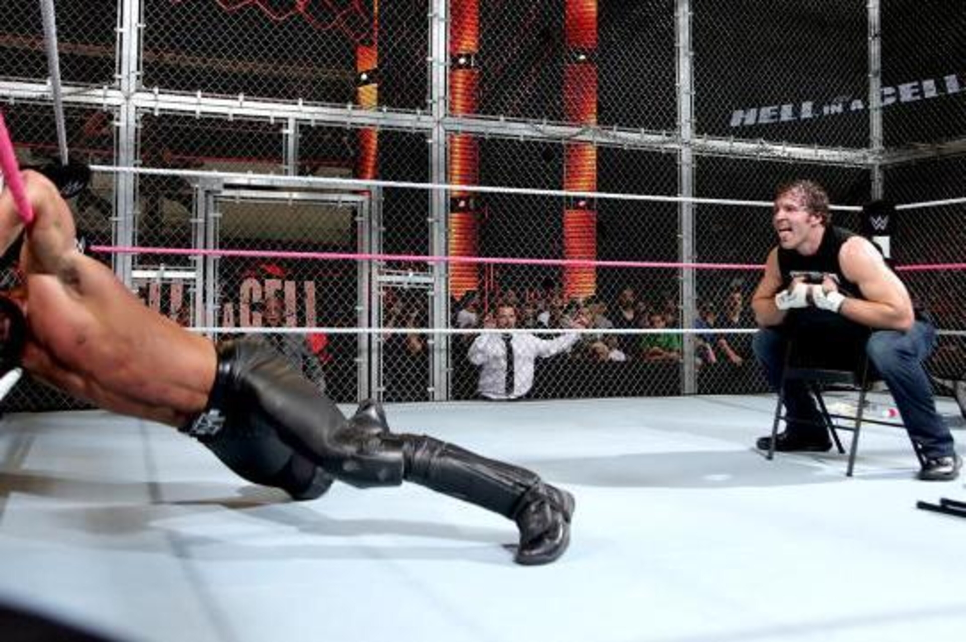 Dean Ambrose taunts Seth Rollins. Dean Ambrose taunts Seth Rollins.