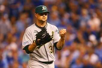 KANSAS CITY, MO - SEPTEMBER 30:  Jon Lester #31 of the Oakland Athletics reacts after the third out in the seventh inning against the Kansas City Royals during the American League Wild Card game at Kauffman Stadium on September 30, 2014 in Kansas City, Mi