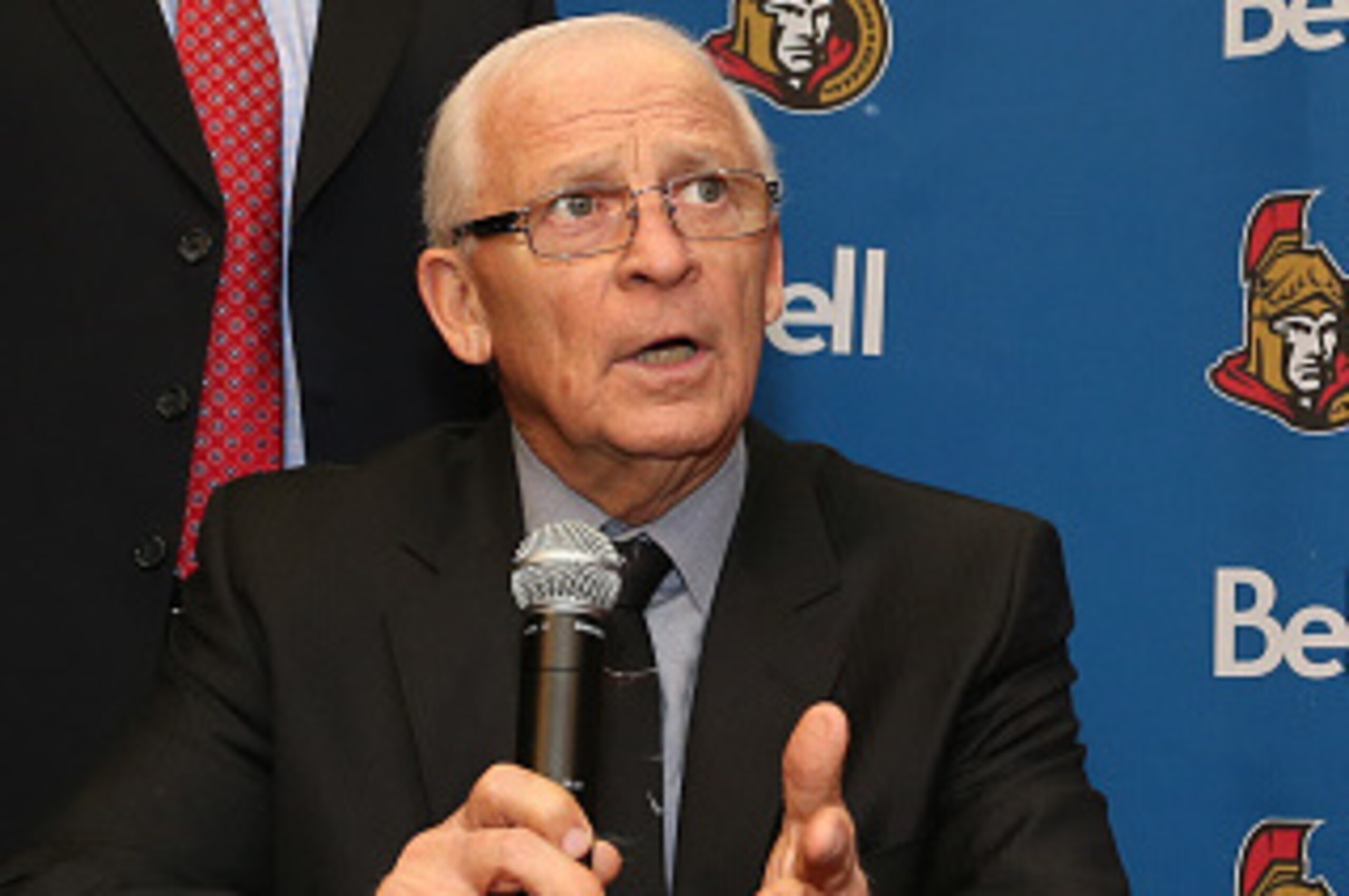 OTTAWA, ON - NOVEMBER 20: Jonathan Pitre signs a one day pro scouting contract with Ottawa Senators general manager Bryan Murray prior to a game against the Nashville Predators at Canadian Tire Centre on November 20, 2014 in Ottawa, Ontario, Canada.  (Pho