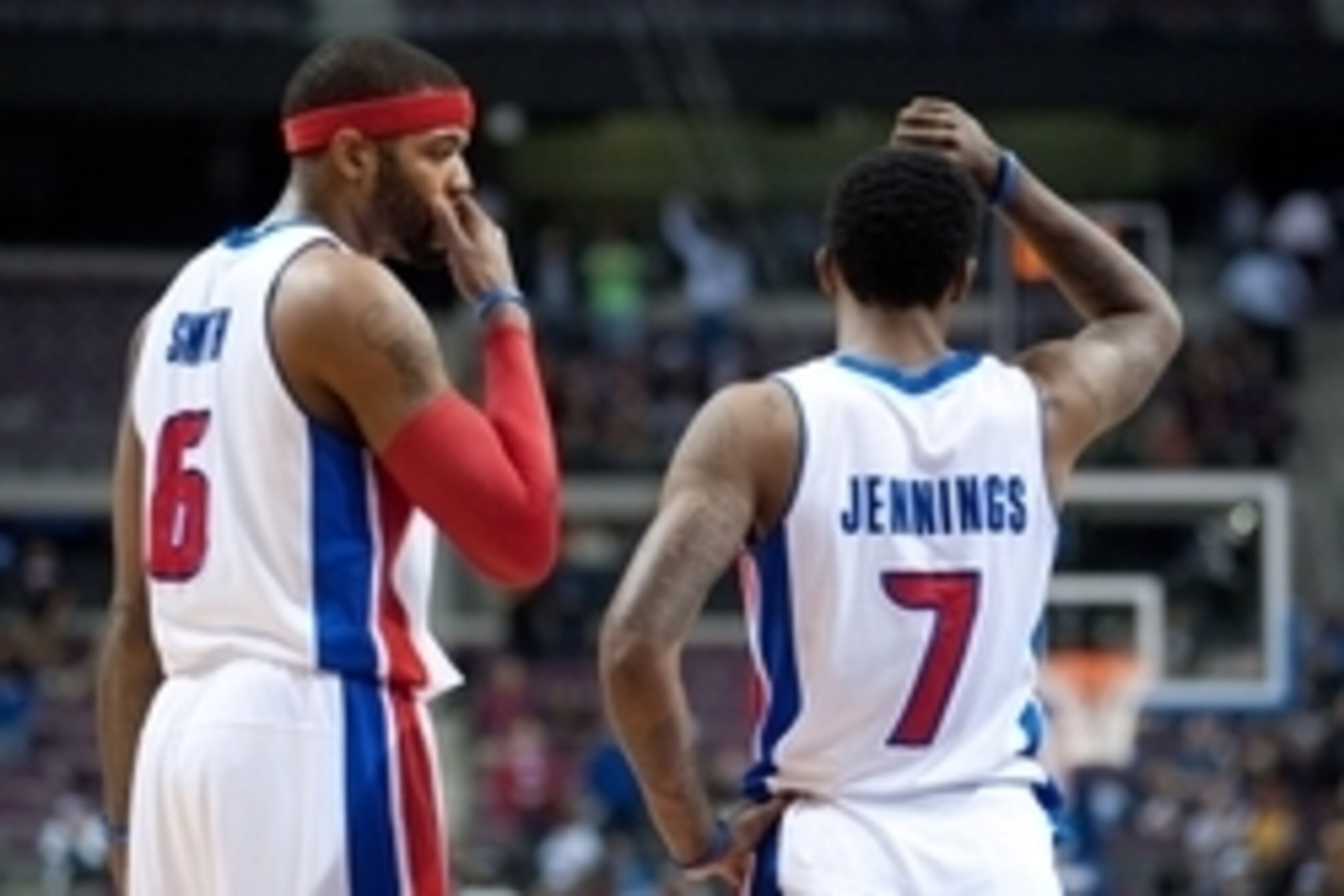 Mar 26, 2014; Auburn Hills, MI, USA; Detroit Pistons forward Josh Smith (6) talks with guard Brandon Jennings (7) during the fourth quarter against the Cleveland Cavaliers at The Palace of Auburn Hills. Cleveland won 97-96. Mandatory Credit: Tim Fuller-US