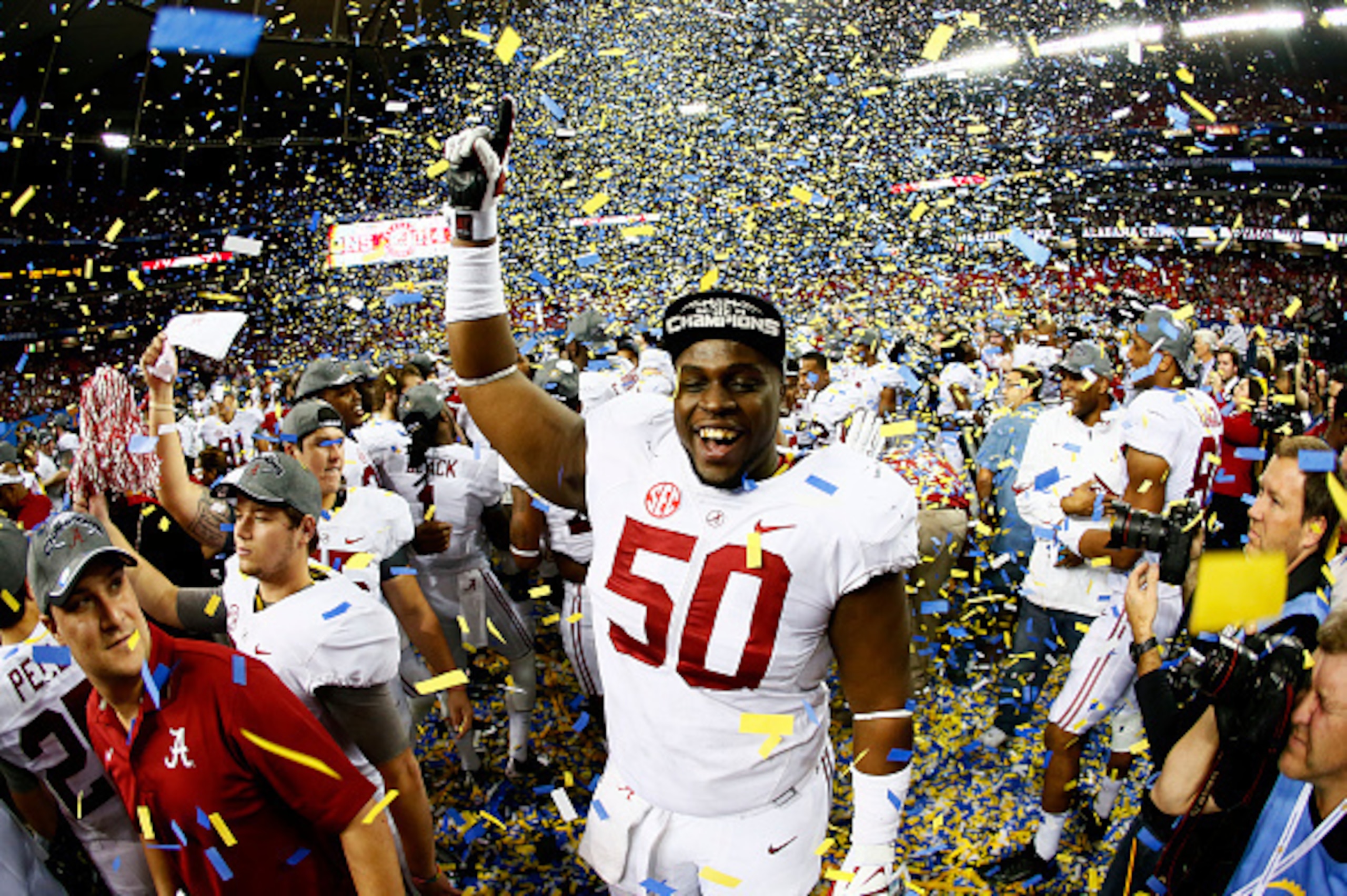 ATLANTA, GA - DECEMBER 06:  Alphonse Taylor #50 of the Alabama Crimson Tide celebrates their 42 to 13 win over the Missouri Tigers in the SEC Championship game at the Georgia Dome on December 6, 2014 in Atlanta, Georgia.  (Photo by Kevin C. Cox/Getty Imag