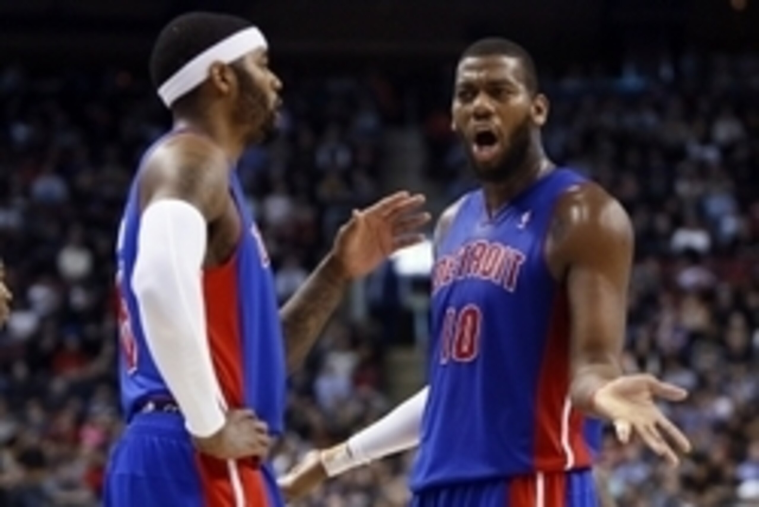 Mar 12, 2014; Toronto, Ontario, CAN; Detroit Pistons forward Josh Smith (6) and forward/center Greg Monroe (10) question a call by an official during the second half against the Toronto Raptors at the Air Canada Centre. Toronto defeated Detroit 101-87. Ma