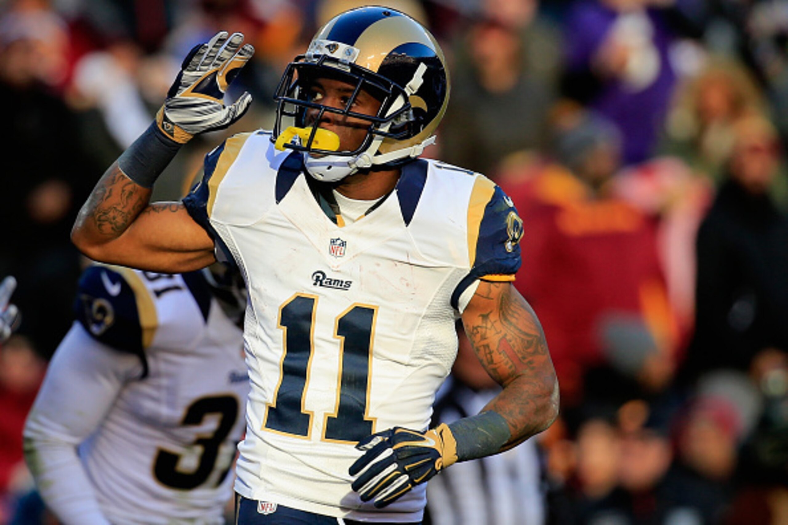 LANDOVER, MD - DECEMBER 07: Wide receiver Tavon Austin #11 of the St. Louis Rams celebrates after a third quarter punt return touchdown agianst the Washington Redskins at FedExField on December 7, 2014 in Landover, Maryland.  (Photo by Rob Carr/Getty Imag