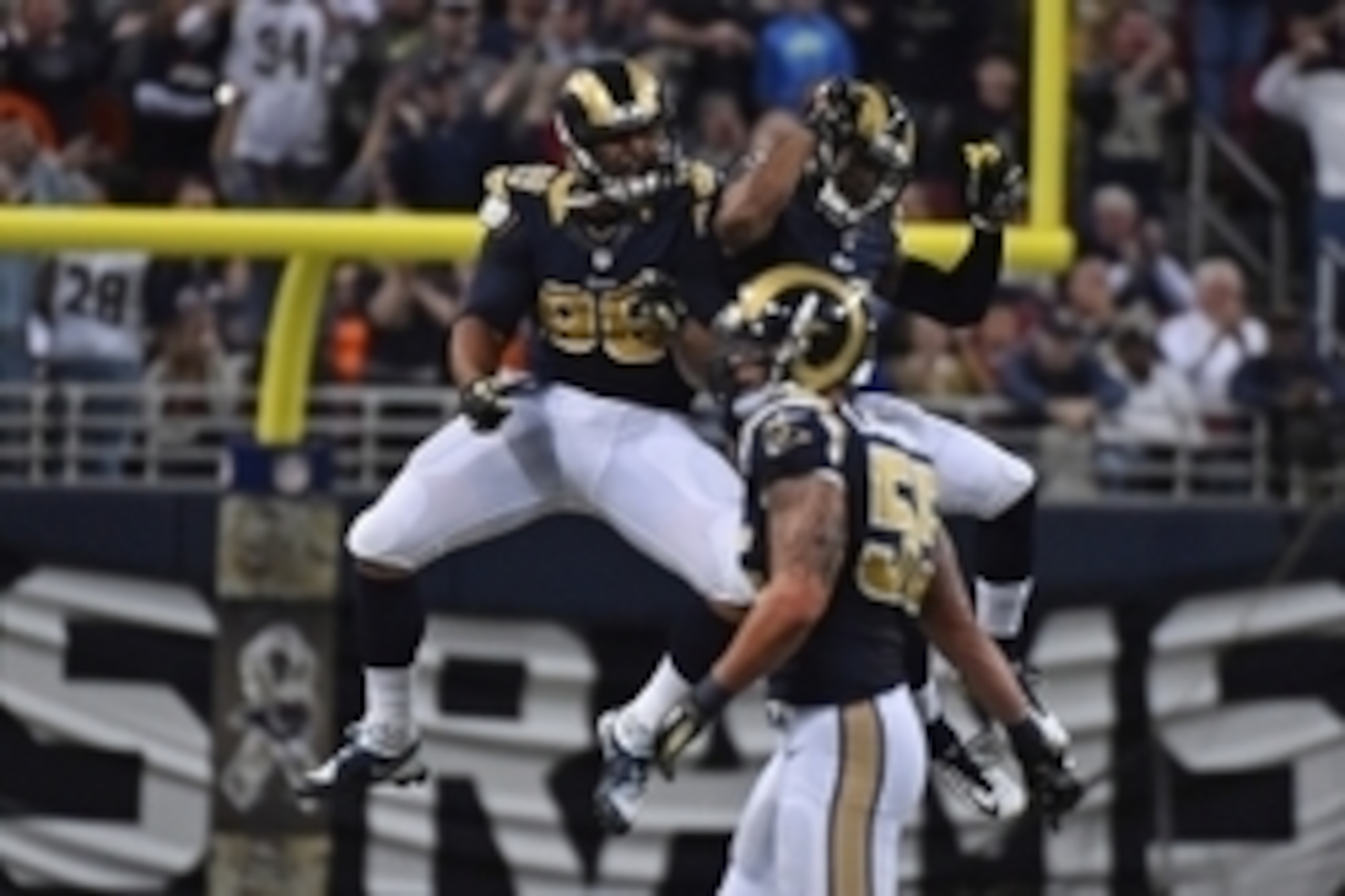 Nov 16, 2014; St. Louis, MO, USA; St. Louis Rams defensive tackle Aaron Donald (99) celebrates after sacking Denver Broncos quarterback Peyton Manning (not pictured) during the second half at the Edward Jones Dome. The Rams won 22-7. Mandatory Credit: Jas