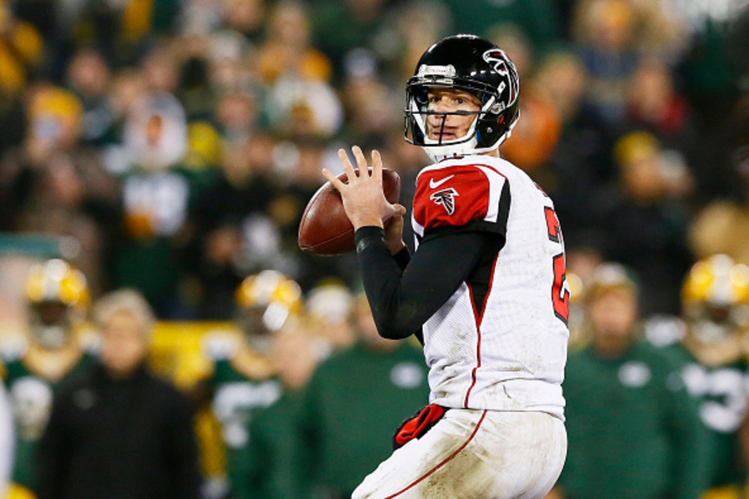 GREEN BAY, WI - DECEMBER 08:   Matt Ryan #2 of the Atlanta Falcons looks to pass against the Green Bay Packers in the third quarter at Lambeau Field on December 8, 2014 in Green Bay, Wisconsin.  (Photo by Kevin C. Cox/Getty Images)