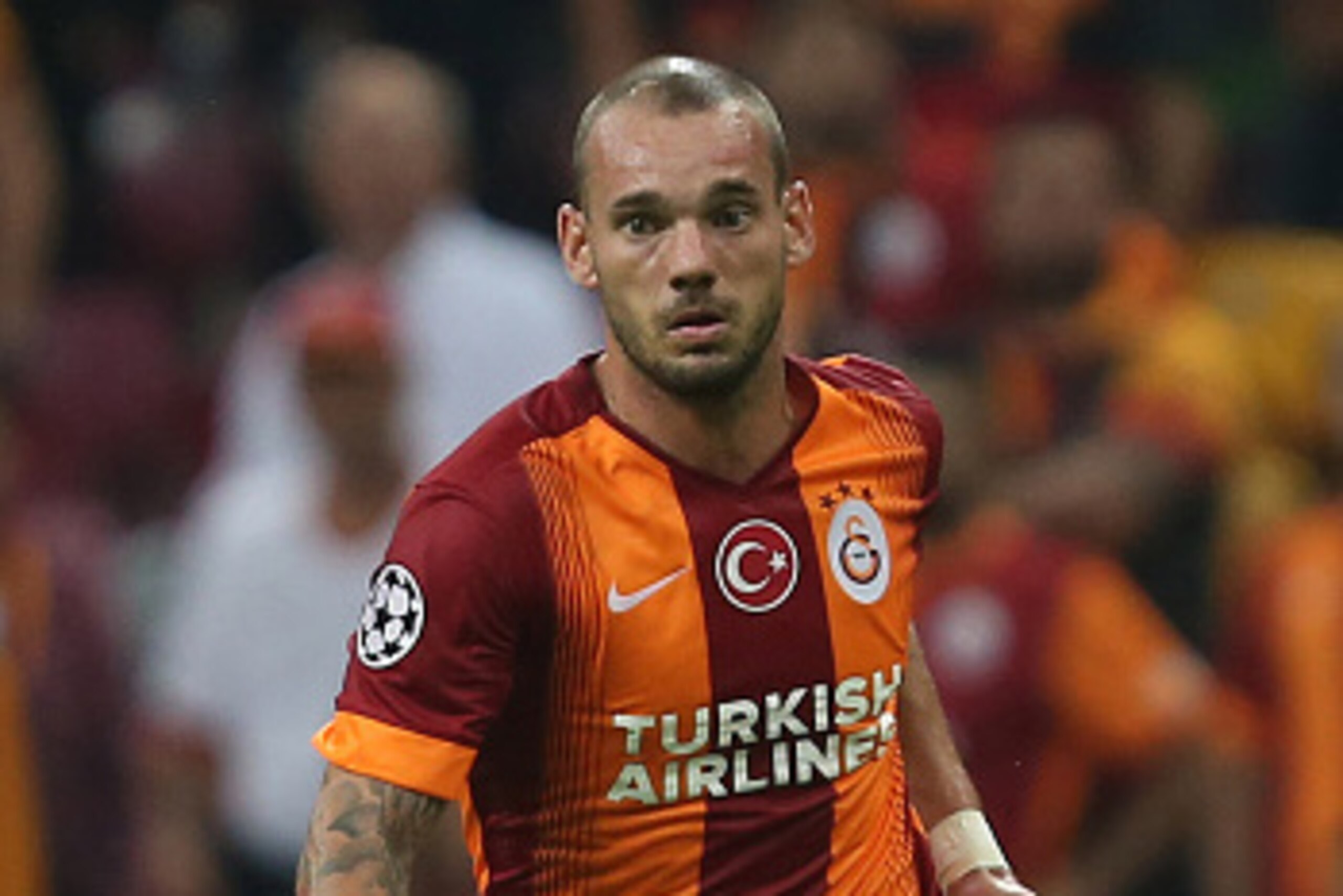 ISTANBUL, TURKEY - SEPTEMBER 16: Wesley Sneijder of Galatasaray runs with the ball during the UEFA Champions League group D match between Galatasaray AS and RSC Anderlecht against Anderlecht on September 16, 2014, at TT Arena Stadium in Istanbul, Turkey ISTANBUL, TURKEY - SEPTEMBER 16: Wesley Sneijder of Galatasaray runs with the ball during the UEFA Champions League group D match between Galatasaray AS and RSC Anderlecht against Anderlecht on September 16, 2014, at TT Arena Stadium in Istanbul, Turkey