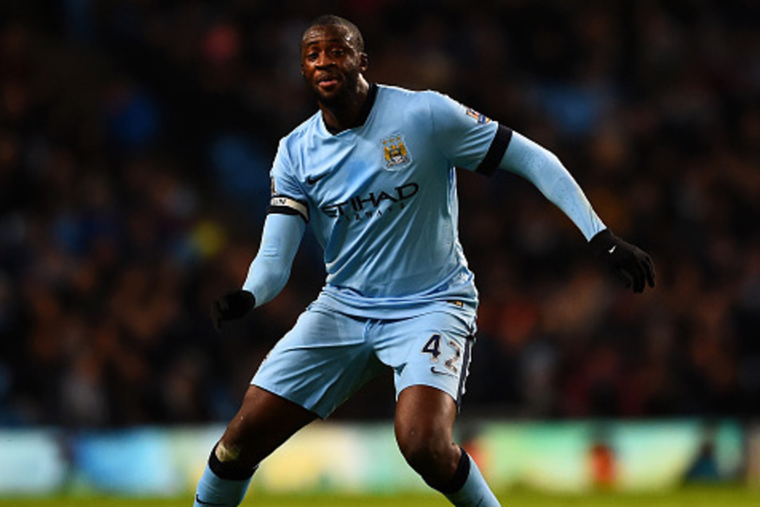 MANCHESTER, ENGLAND - DECEMBER 06:  Yaya Toure of Manchester City in action during the Barclays Premier League match between Manchester City and Everton at Etihad Stadium on December 6, 2014 in Manchester, England.  (Photo by Laurence Griffiths/Getty Imag