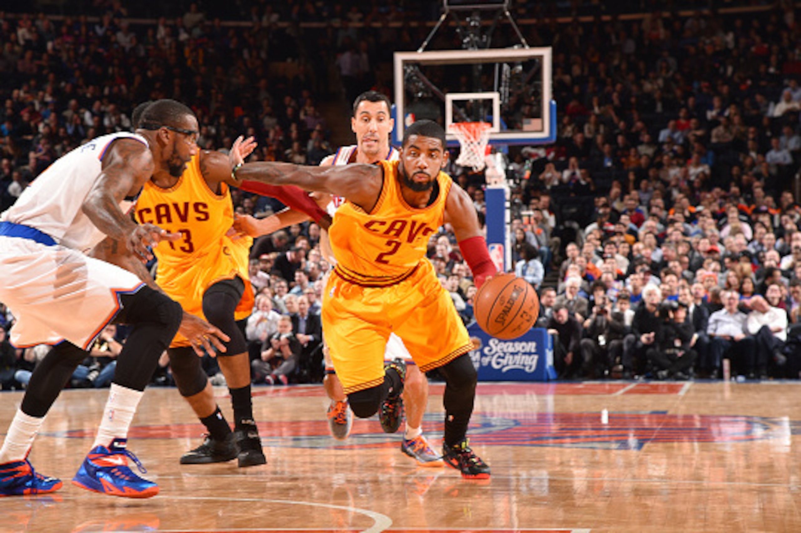 NEW YORK, NY - December 4: Kyrie Irving #2 of the Cleveland Cavaliers breaks fast for the basket against the New York Knicks during the game on December 4, 2014 at Madison Square Garden in New York City, New York. NOTE TO USER: User expressly acknowledges