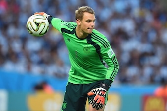 RIO DE JANEIRO, BRAZIL - JULY 13: Goalkeeper Manuel Neuer of Germany controls the ball during the 2014 FIFA World Cup Brazil Final match between Germany and Argentina at Maracana on July 13, 2014 in Rio de Janeiro, Brazil. (Photo by Matthias Hangst/Gett RIO DE JANEIRO, BRAZIL - JULY 13: Goalkeeper Manuel Neuer of Germany controls the ball during the 2014 FIFA World Cup Brazil Final match between Germany and Argentina at Maracana on July 13, 2014 in Rio de Janeiro, Brazil. (Photo by Matthias Hangst/Gett